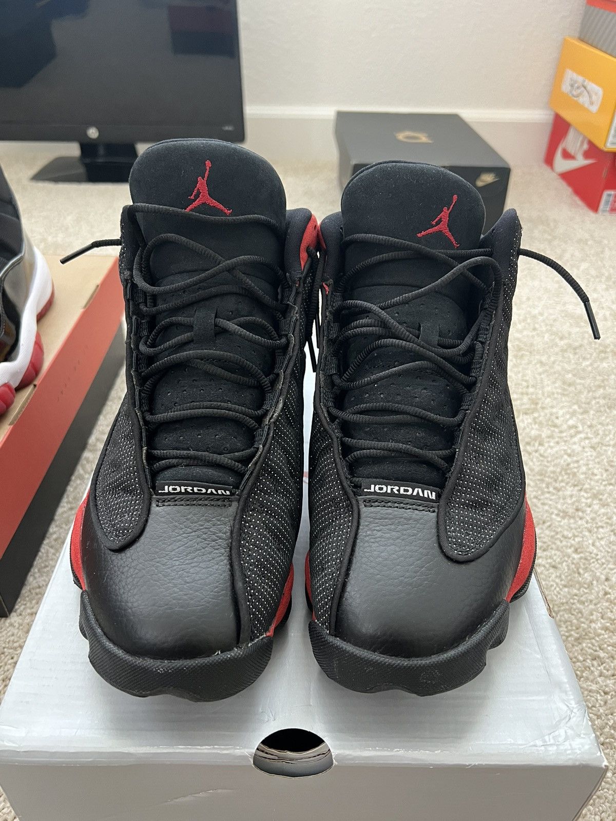 image of Air Jordan 13 Retro 2017 Shoes in Black/Red, Men's (Size 10)