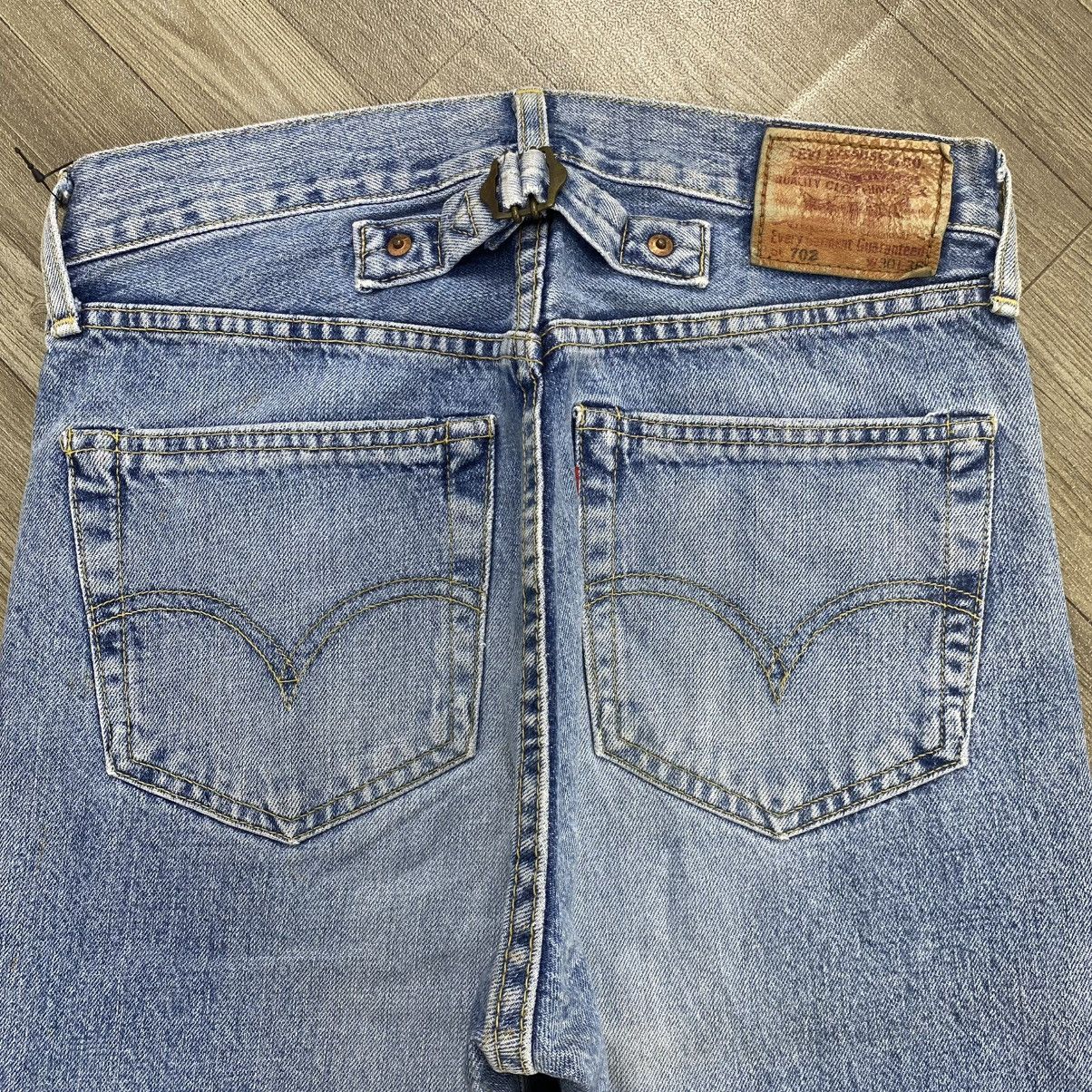 Levi's Vintage Clothing 🇯🇵 1990s Vintage Levis 702xx Selvedge Buckle Back Faded Jeans Size US 30 / EU 46 - 18 Thumbnail