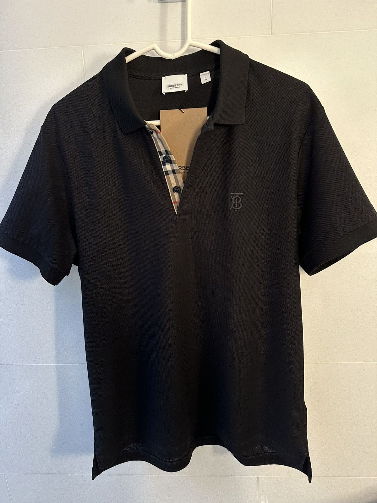 Burberry hotsell London men's black polo shirt size medium