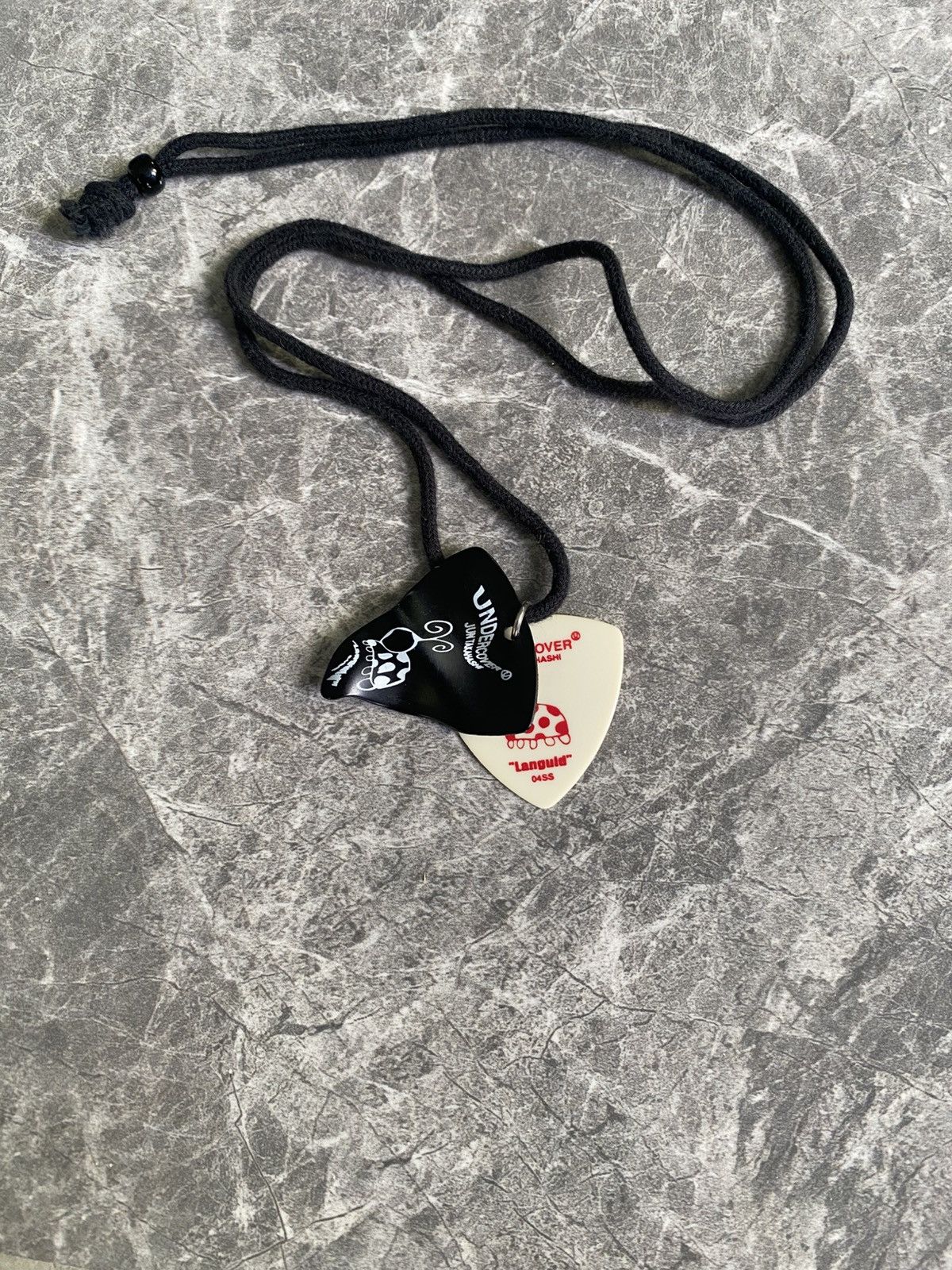 Undercover Guitar Pick Necklace | Grailed