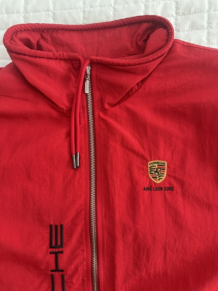 Aime Leon Dore × Porsche Design Aime Leon Dore Porsche Nylon Track Jacket Men’s Tango Red Size US XL / EU 56 / 4 - 5 Thumbnail