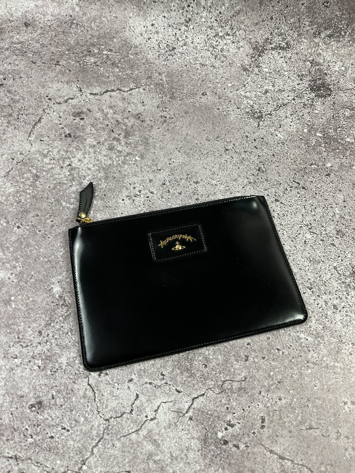 Vivienne Westwood Vivienne Westwood Black Leather Logo Zip Clutch Bag Size ONE SIZE - 1 Thumbnail