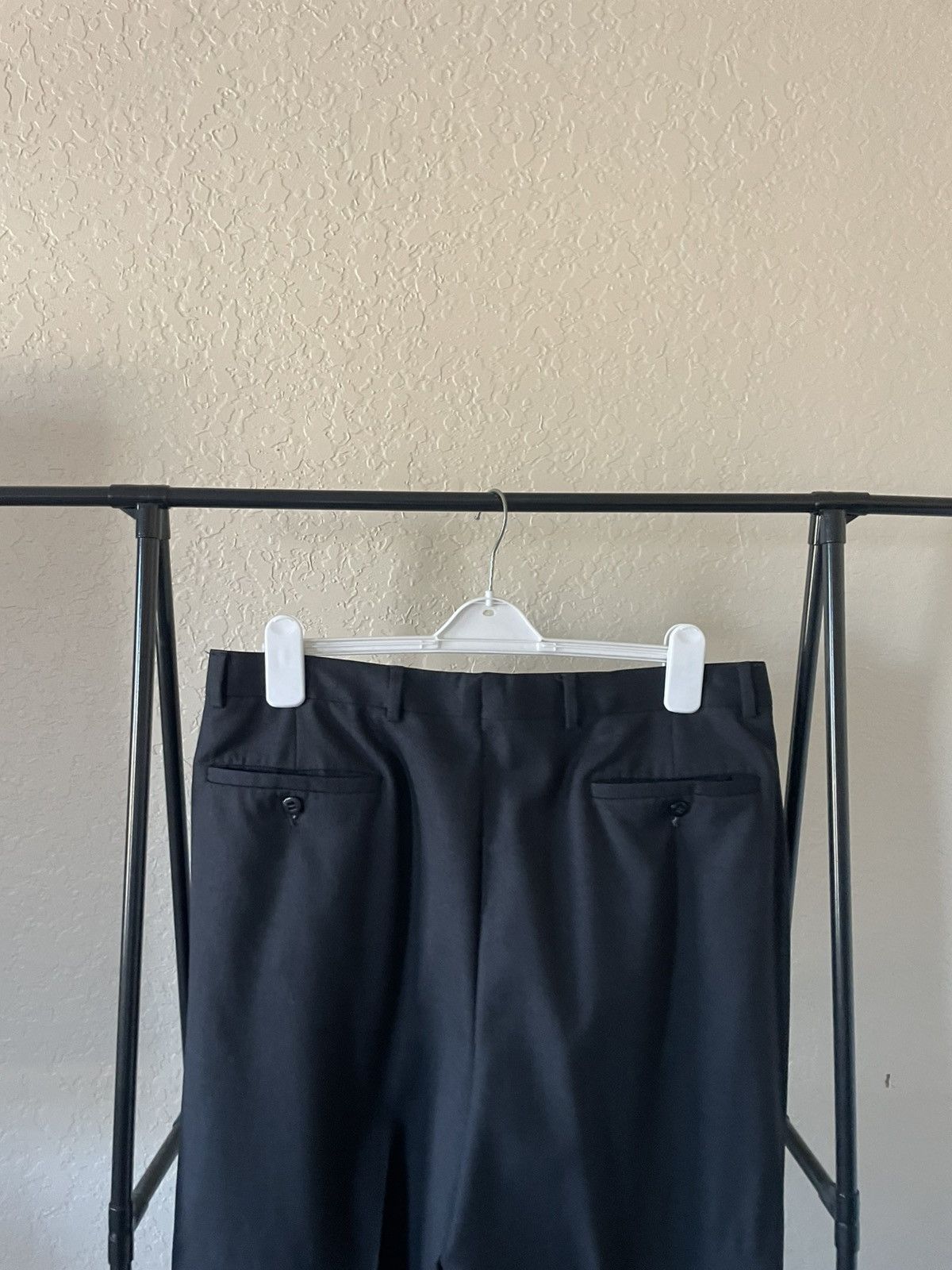 Jesse Model Wool pleated trousers