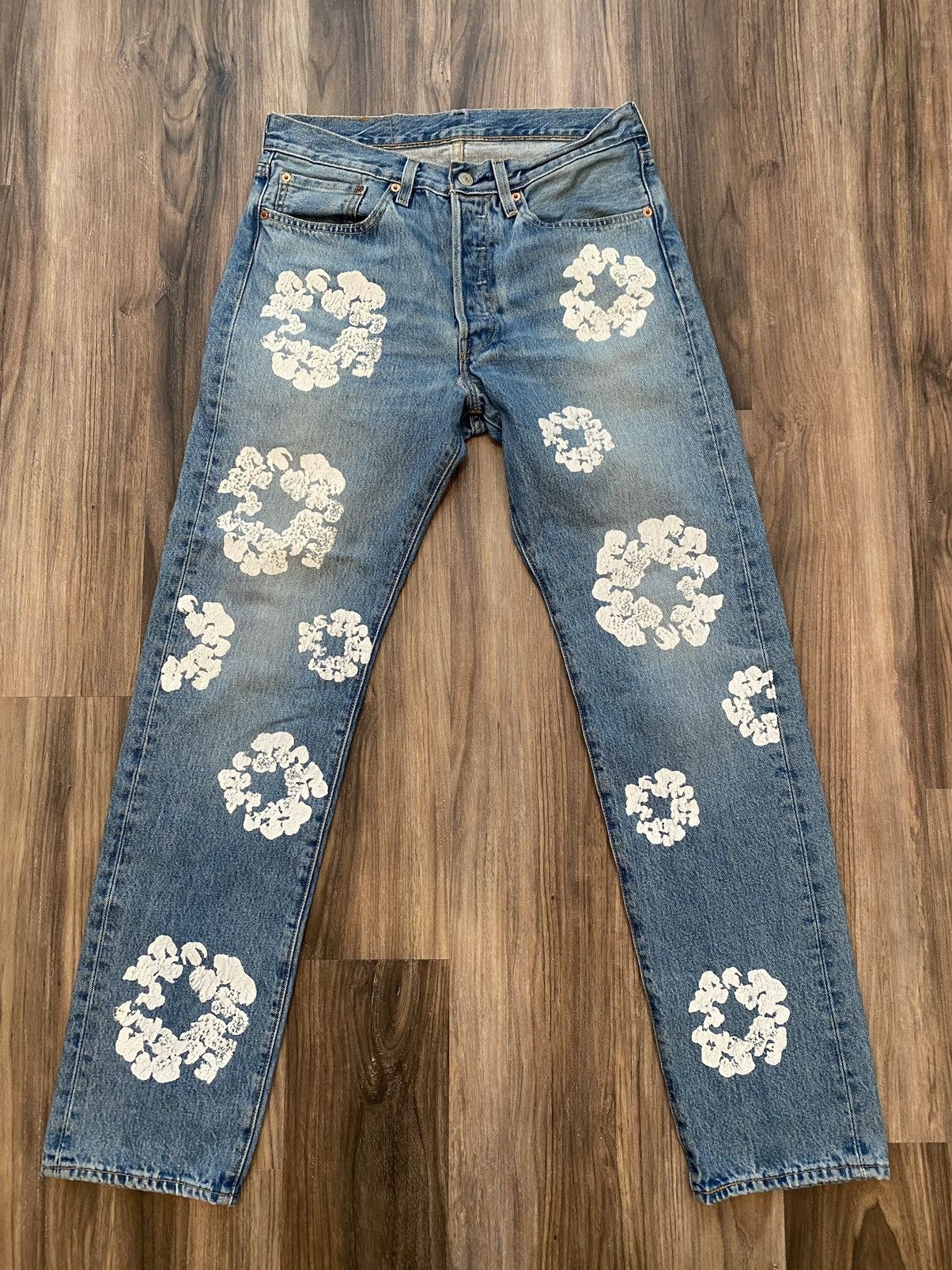 image of Denim Tears Light Washed Jeans in Blue, Men's (Size 32)