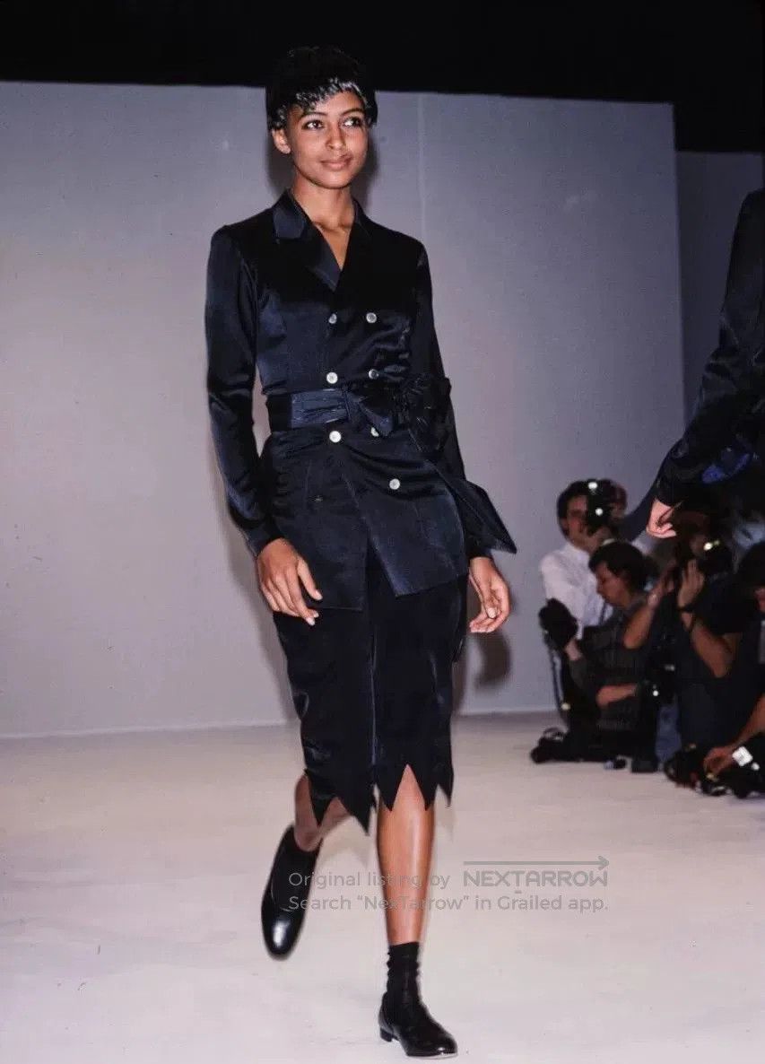 Comme des Garçons Black Tail Hem Pants.
