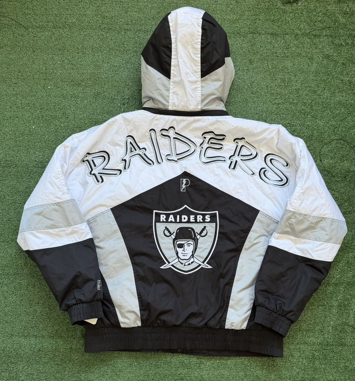 Pro Player LAS VEGAS RAIDERS PRO PLAYER “SCRIPT“ SPELL OUT VTG STYLE Size US XL / EU 56 / 4 - 5 Thumbnail