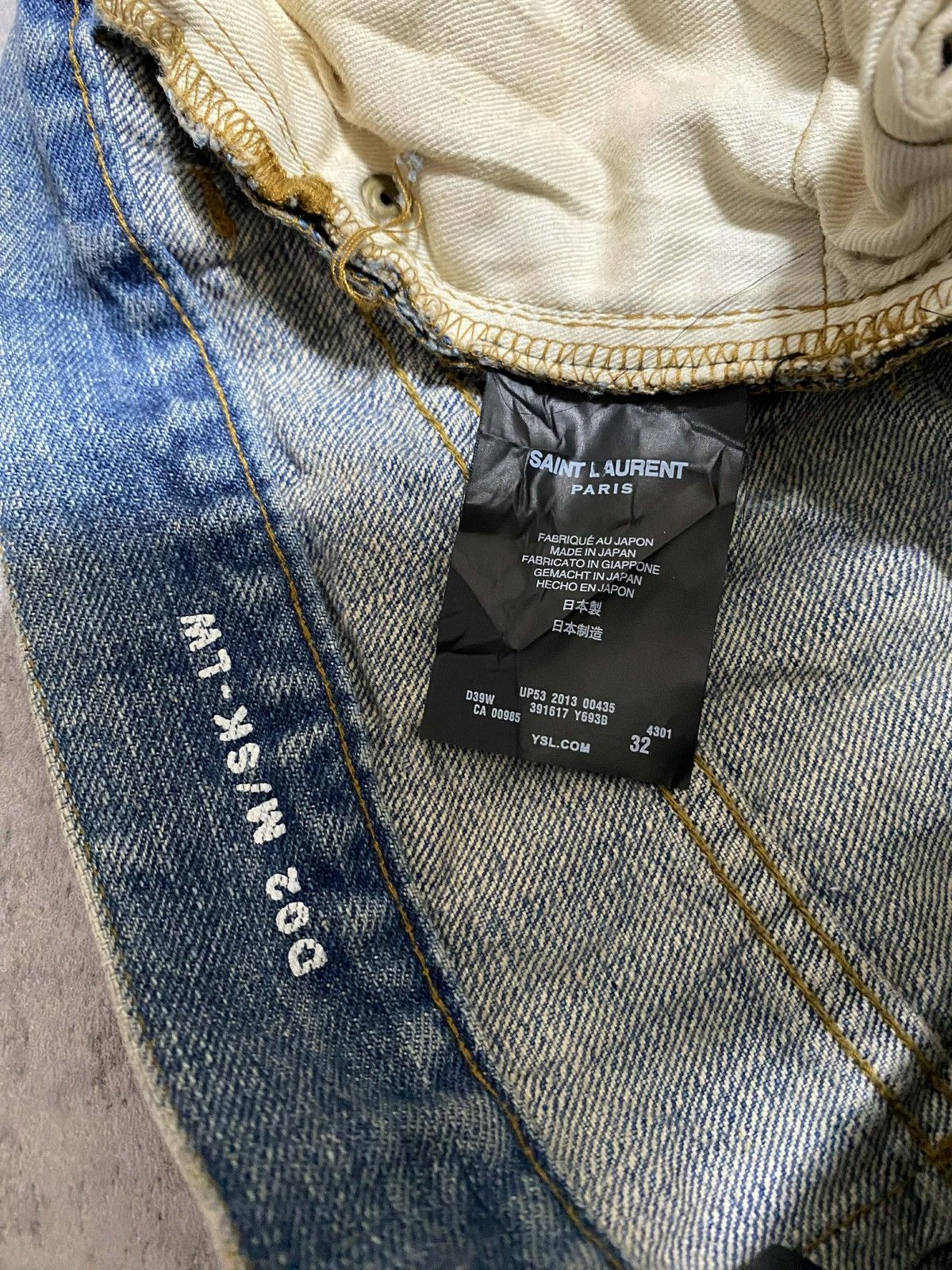 SAINT LAURENT PARIS DO2 DAMAGED DENIM PANTS BY HEDI SLIMANE - www 