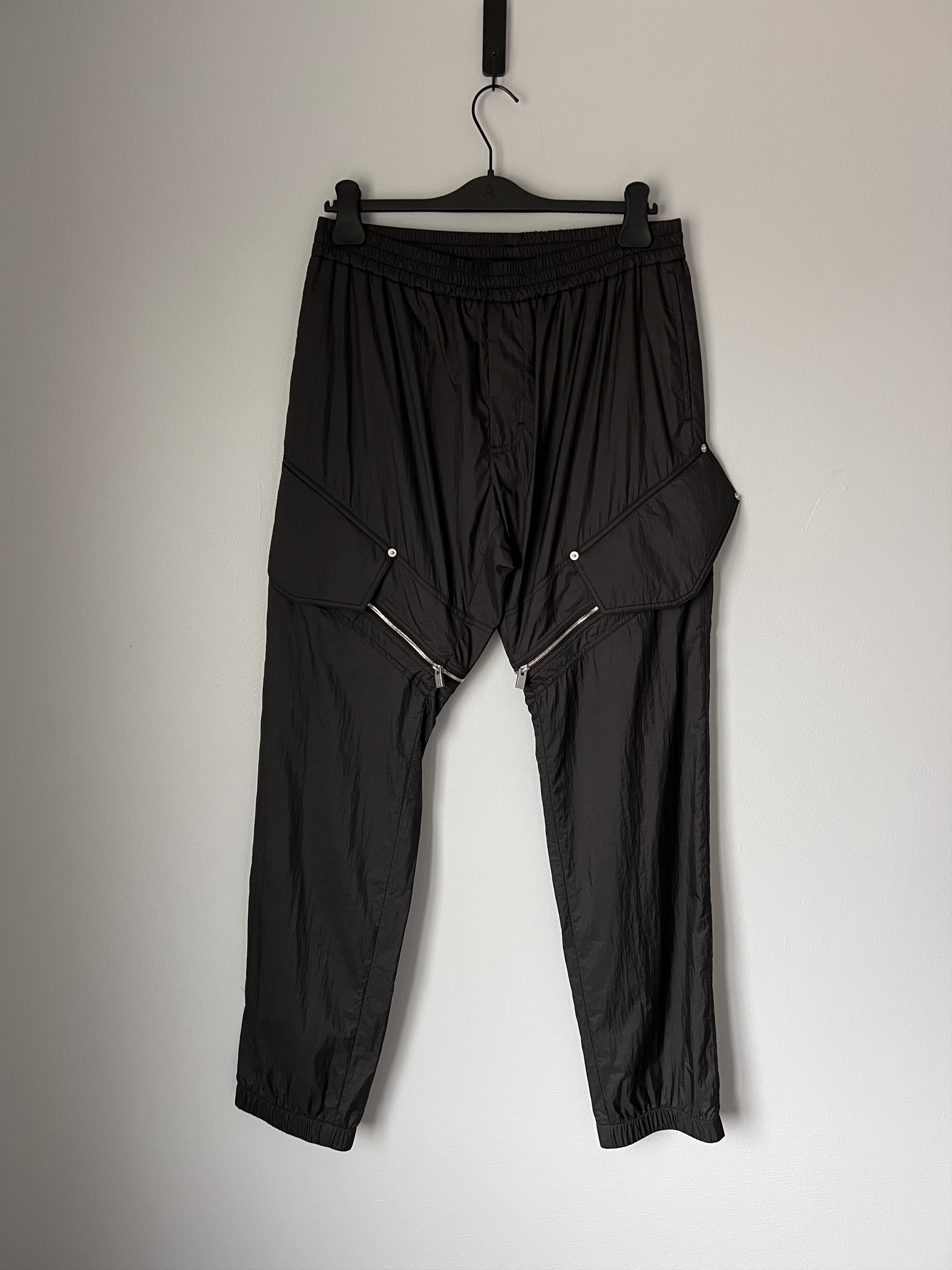 1017 Alyx 9SM Slanted Zip Cargo Track Pants in Black