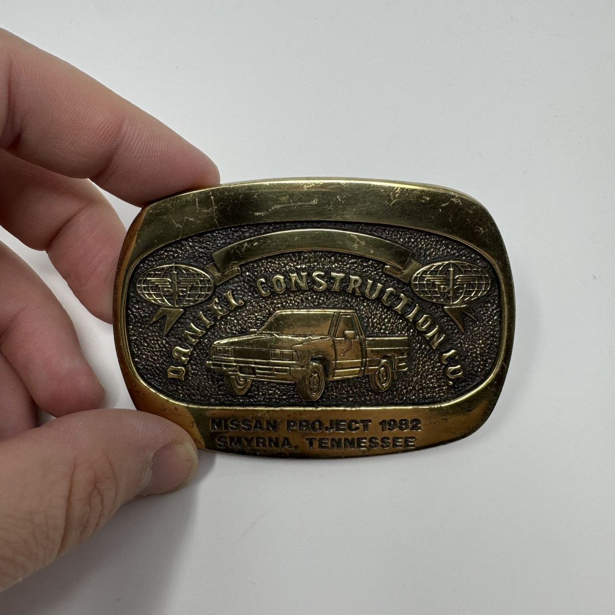 Vintage 1982 Daniel Construction Co Nissan Project Belt Buckle Size ONE SIZE - 2 Thumbnail
