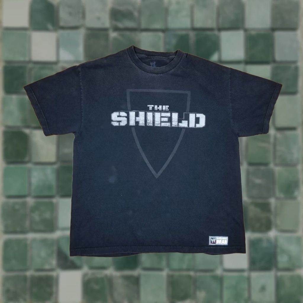 Vintage VINTAGE WWE THE SHIELD T-SHIRT Cotton Black XLARGE Mens Short Sleeve Round Neck 23 INCH Chest 28 INCH Back Length Size US XL / EU 56 / 4 - 1 Thumbnail