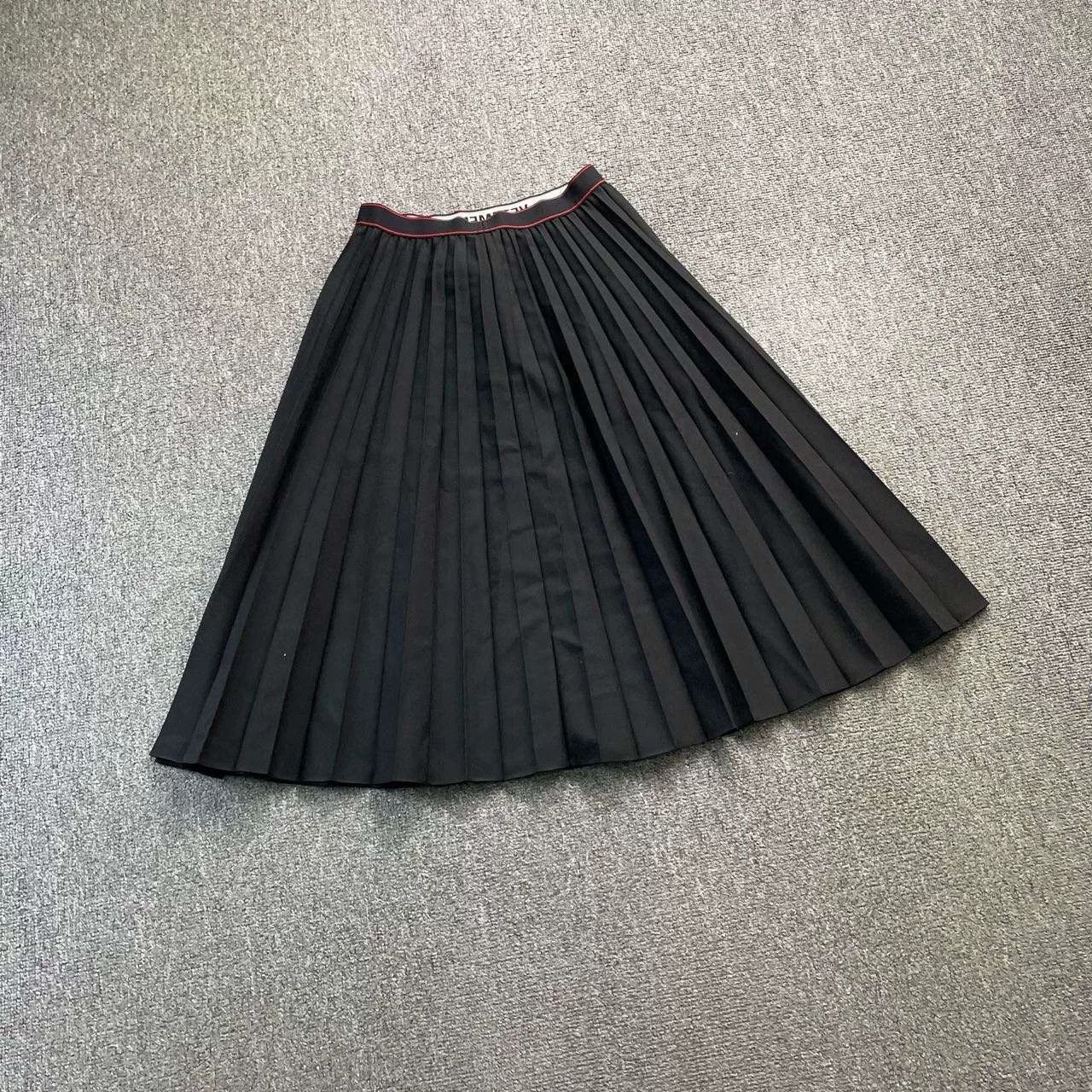 pleated skirt by vetements in black