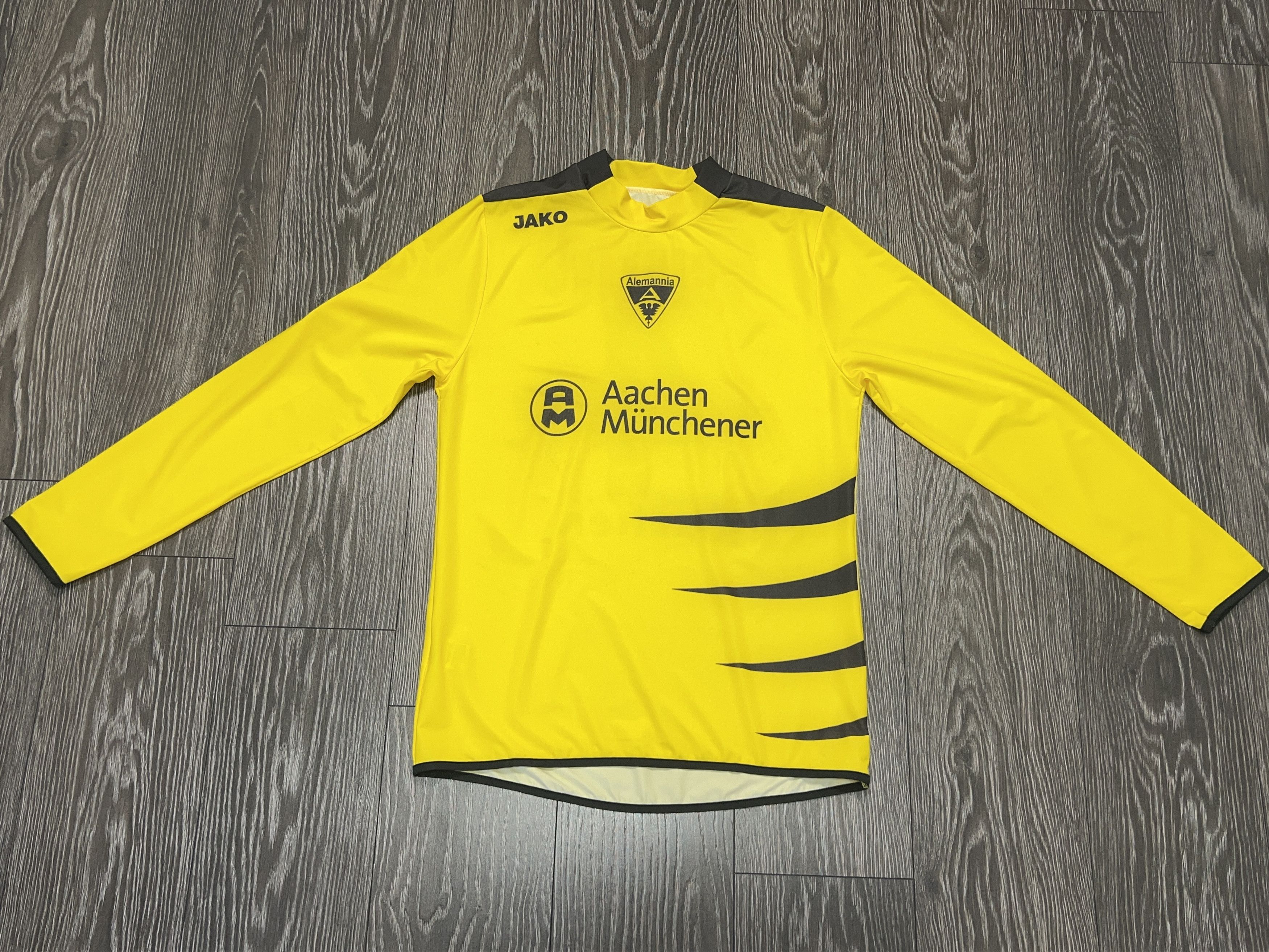 Vintage JAKO Alemannia Aachen #4 Heidrich 2006/07 Football Jersey Size US L / EU 52-54 / 3 - 8 Thumbnail