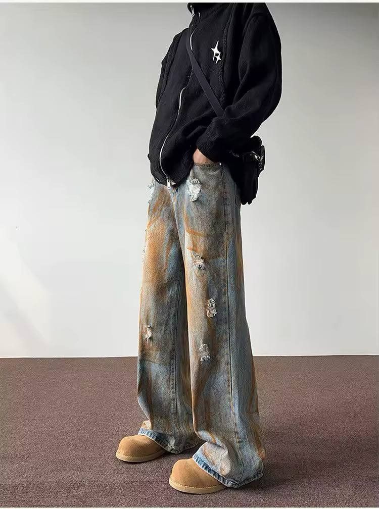 ripped casual jeans in a rust color.