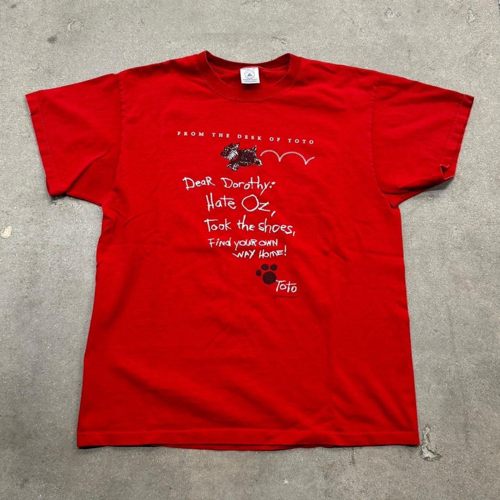 Vintage 1996 Wizard Of Oz Almira Gulch Riding a bike | Grailed