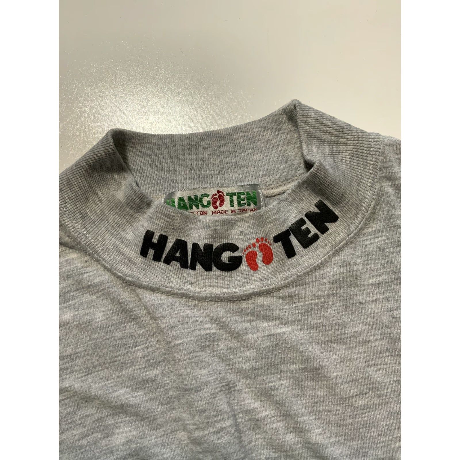 Hang Ten VINTAGE Hang Ten T-Shirt Gray Footprint Mock Neck L/S 80s Made In Japan S Mens Girls? Size US S / EU 44-46 / 1 - 2 Thumbnail