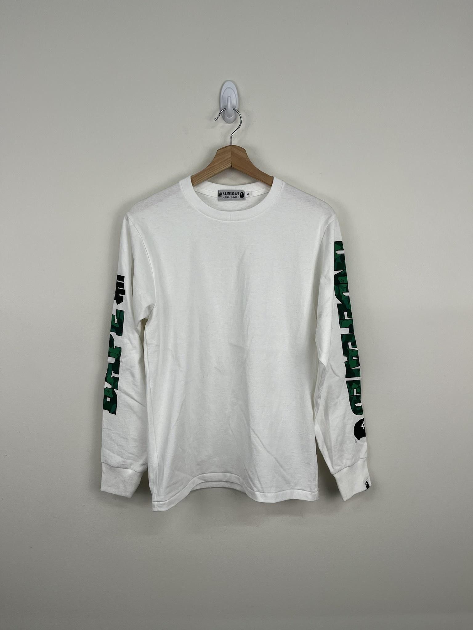 image of Bape x Undefeated Sleeve Print Long Sleeve in White, Men's (Size Small)