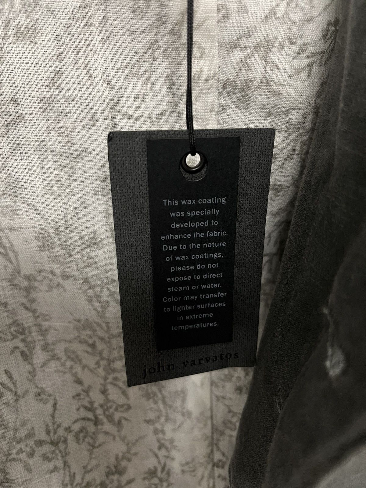 Multibutton cutaway jacket. 48