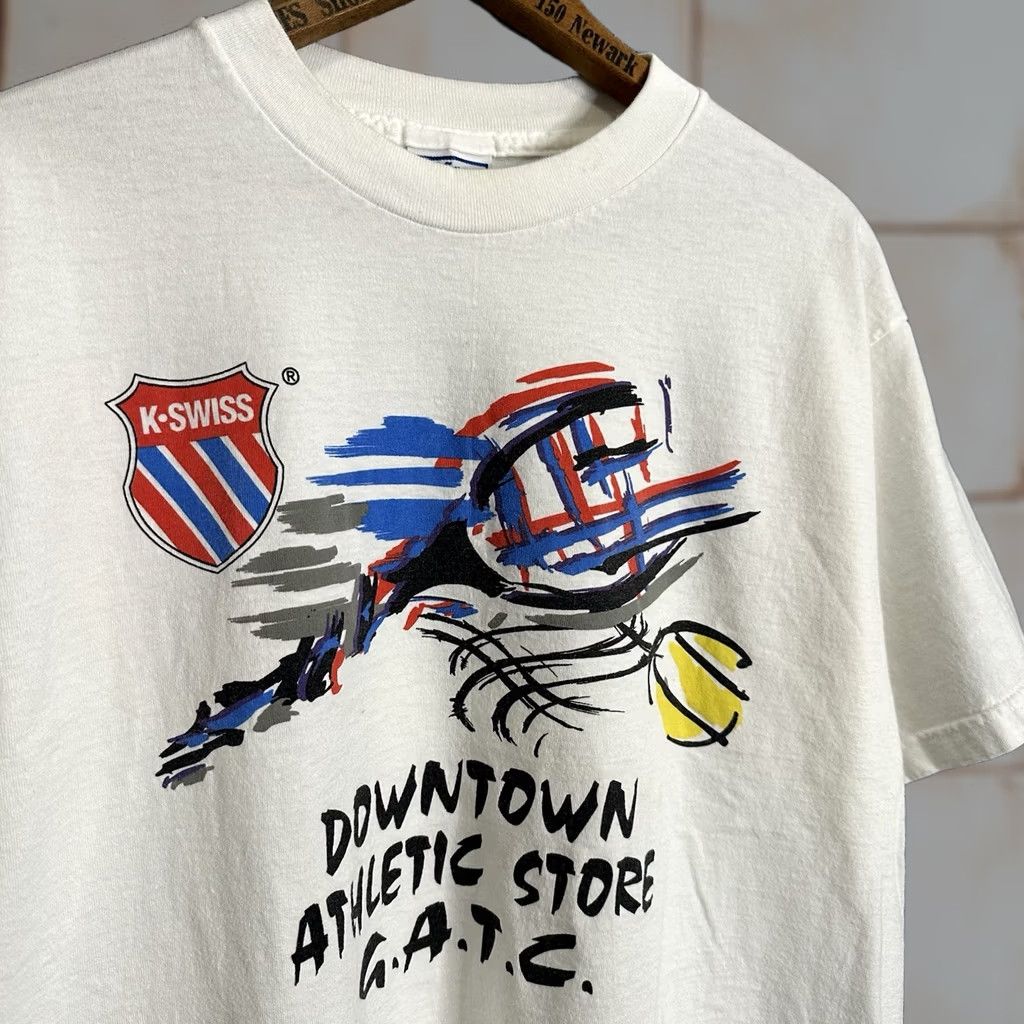 K-Swiss VINTAGE K-Swiss T-Shirt Men's L White 90s Sports Athletic Crew Neck Short Sleeve Cotton Multi-Theme 90s Promotional USA White Size US L / EU 52-54 / 3 - 1 Thumbnail