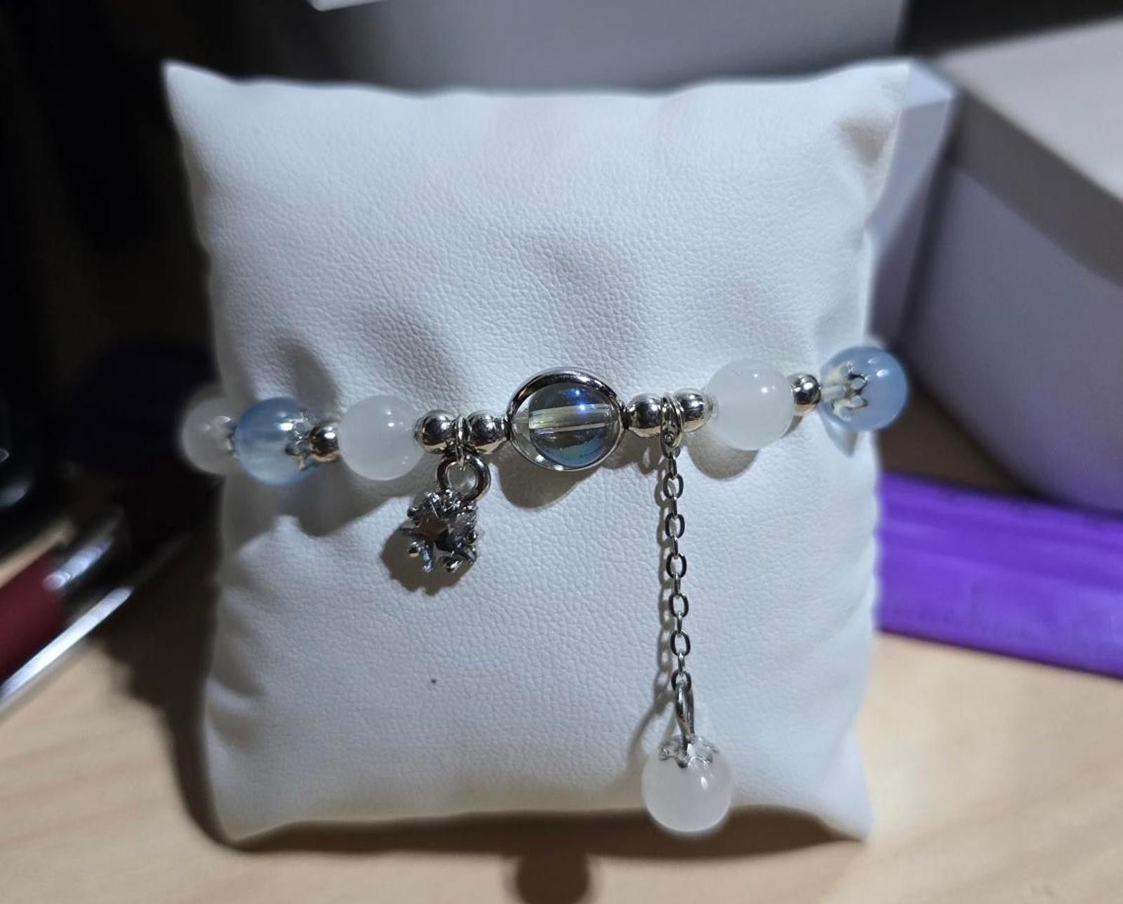 The Unbranded Brand Elegant White Beaded Bracelet with Silver Accents and Charms Size ONE SIZE - 1 Thumbnail