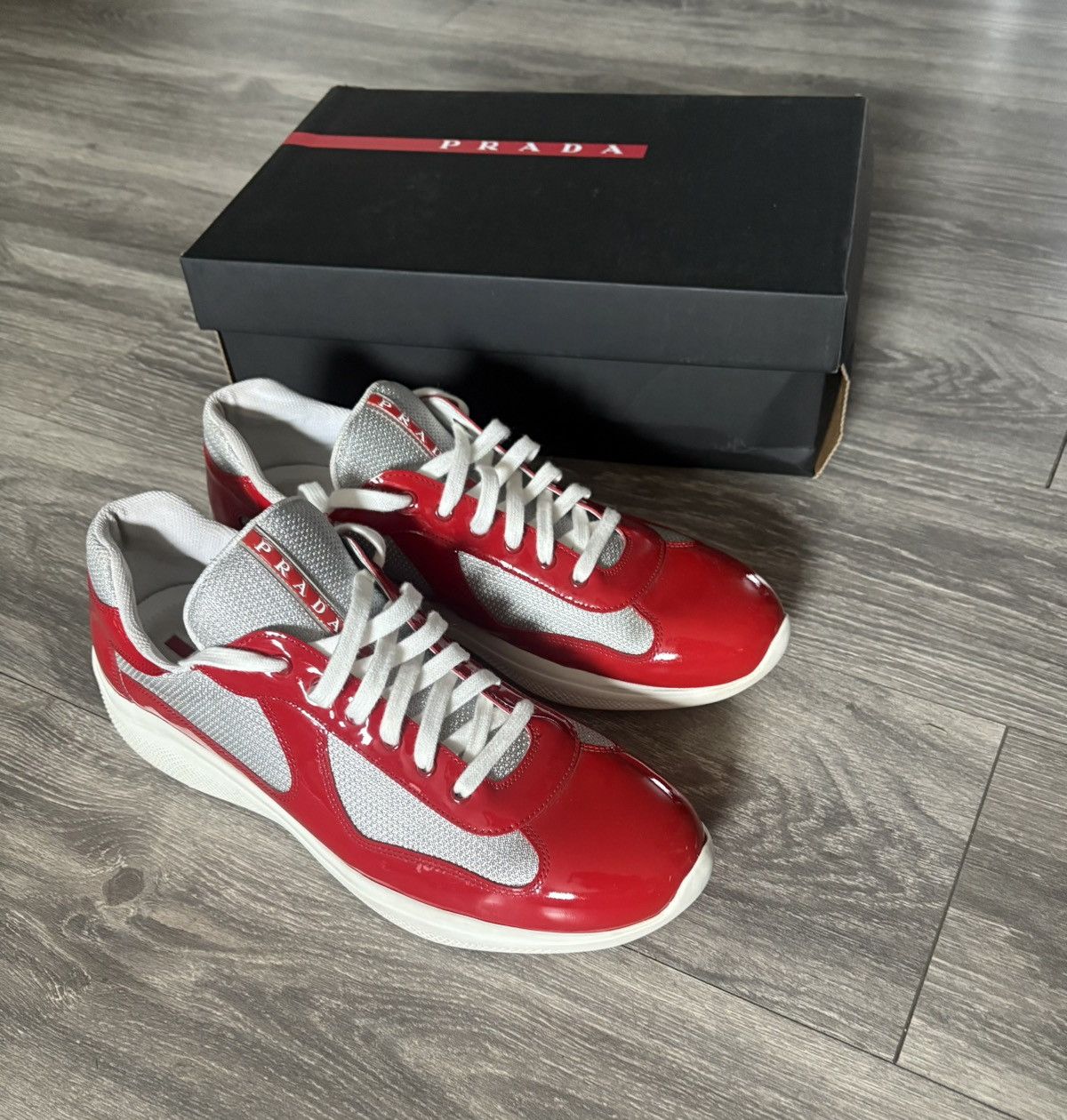 Prada Prada red americas cup sneakers | Grailed