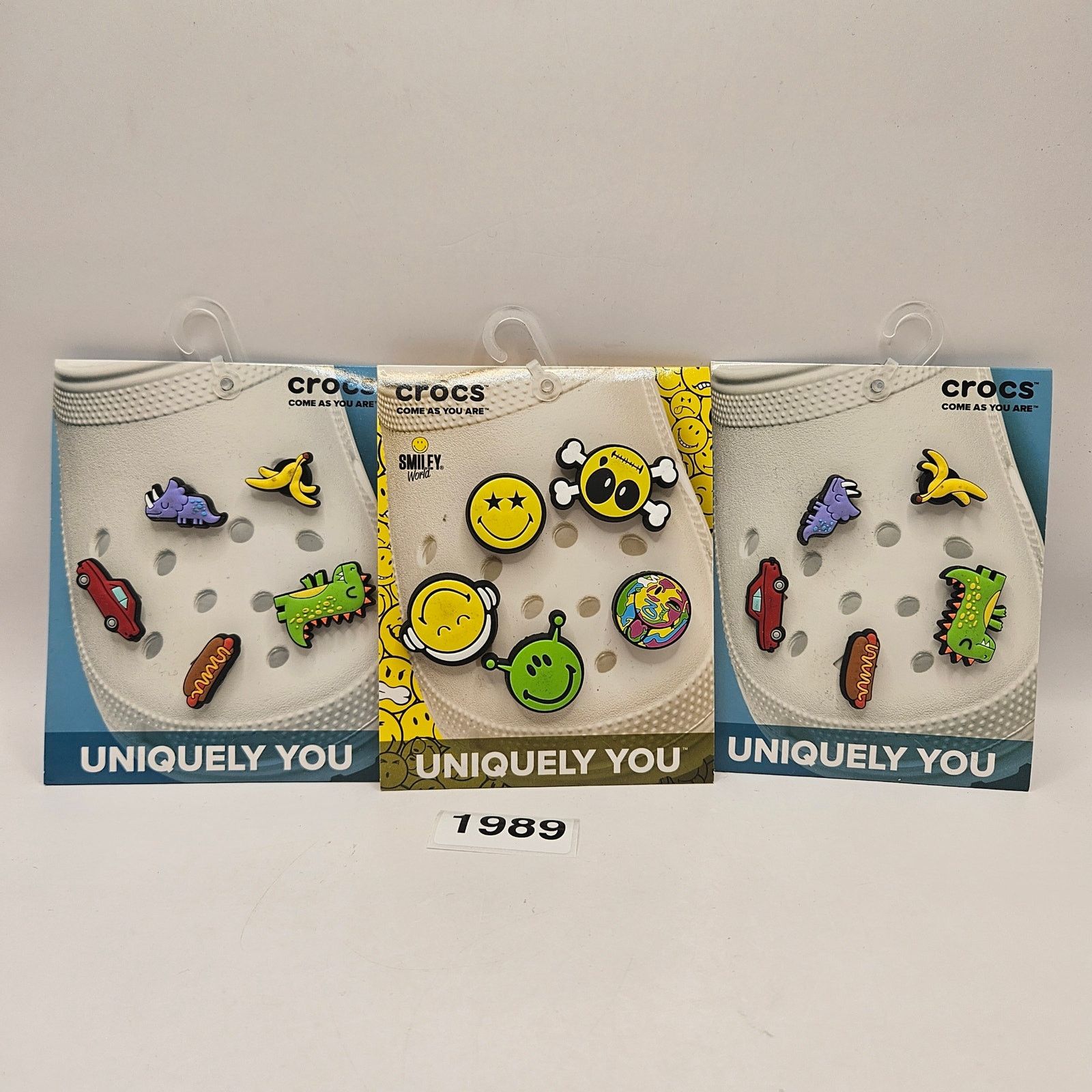 Crocs CROCS JIBBITZ 5PC LOT OF 3(15 CHARMS) SMILEY(1)+DINO(2) NWT Size ONE SIZE - 1 Thumbnail
