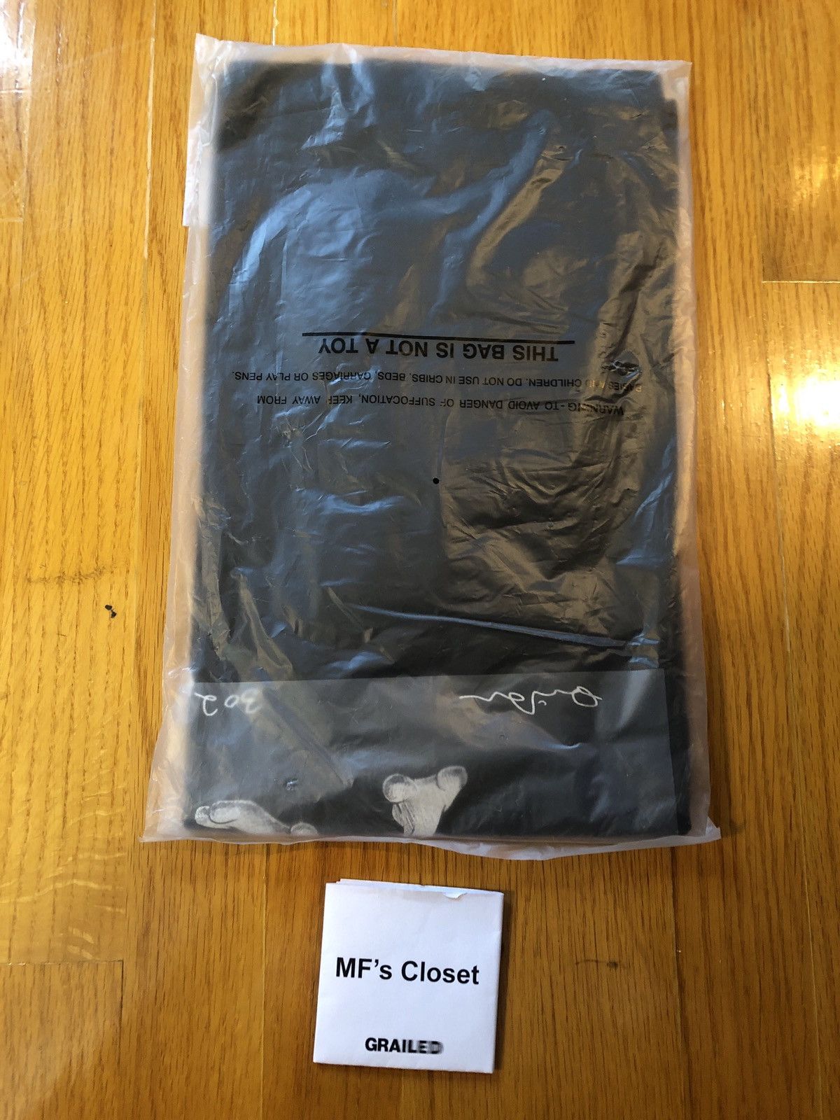 Daniel Arsham × Pokemon × Uniqlo Daniel Arsham x Pokemon x Uniqlo Crystal MewTwo Tee Black M Size US M / EU 48-50 / 2 - 3 Thumbnail