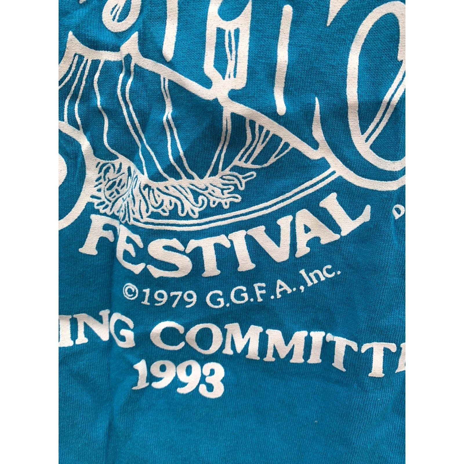 Fruit Of The Loom VINTAGE Gilroy Garlic Festival GGFA Inc Parking Committee 1993 t shirt M blue cotton Men Turquoise Graphics Tee Sportswear/Beach 1990s Shirt Size US M / EU 48-50 / 2 - 3 Thumbnail