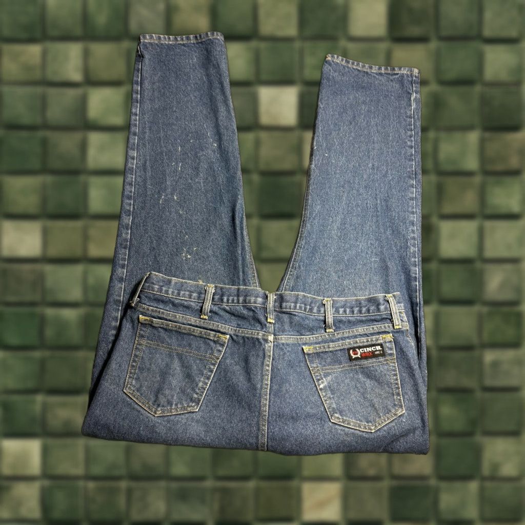 Denime Cinch WRX FR Jeans Men 40x34 Denim White Label Relaxed Flame-Resistant Work Jeans 5-Pocket American Cowboys Color Blue Mens Size US 40 / EU 56 - 1 Thumbnail