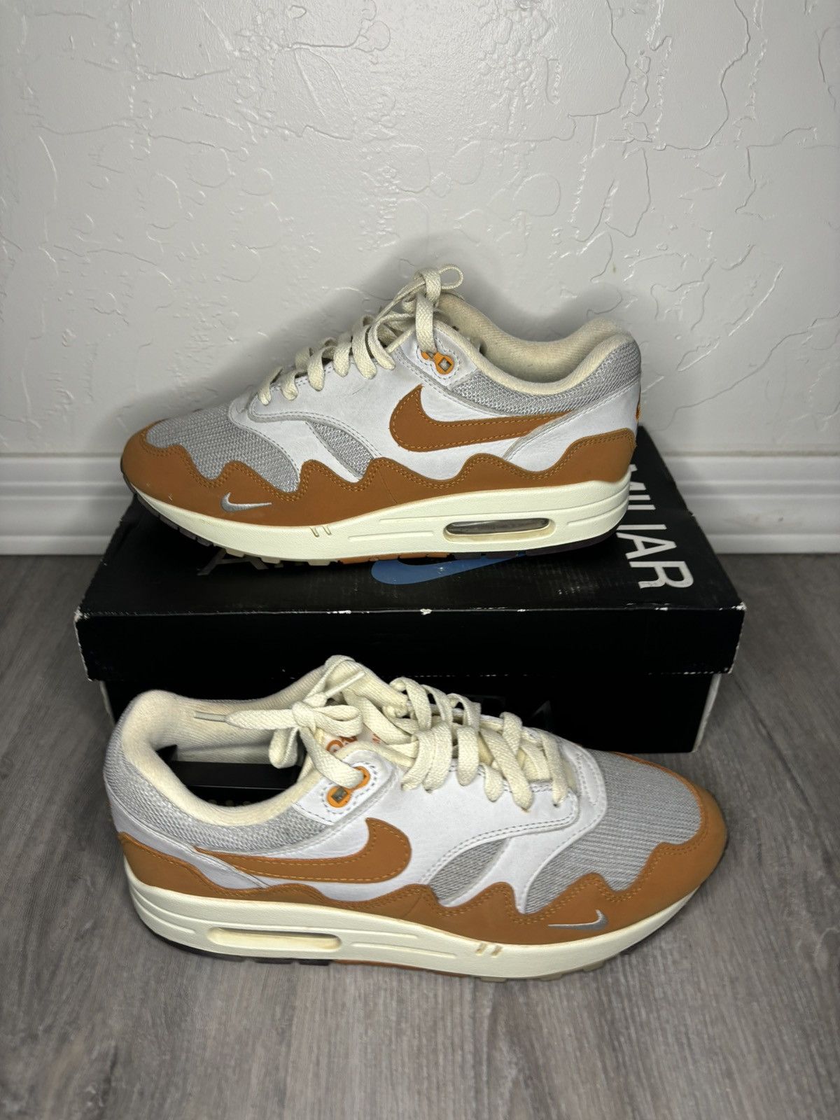 image of Nike Air Max 1 Patta Shoes in Orange, Men's (Size 9)