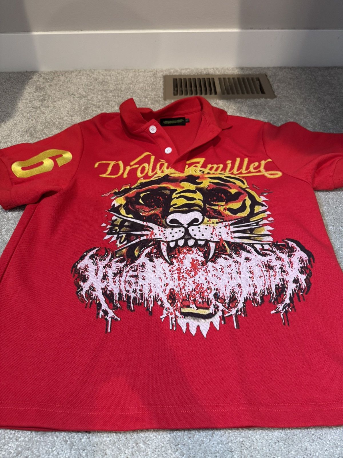 DROLAND MILLER Lion Polo