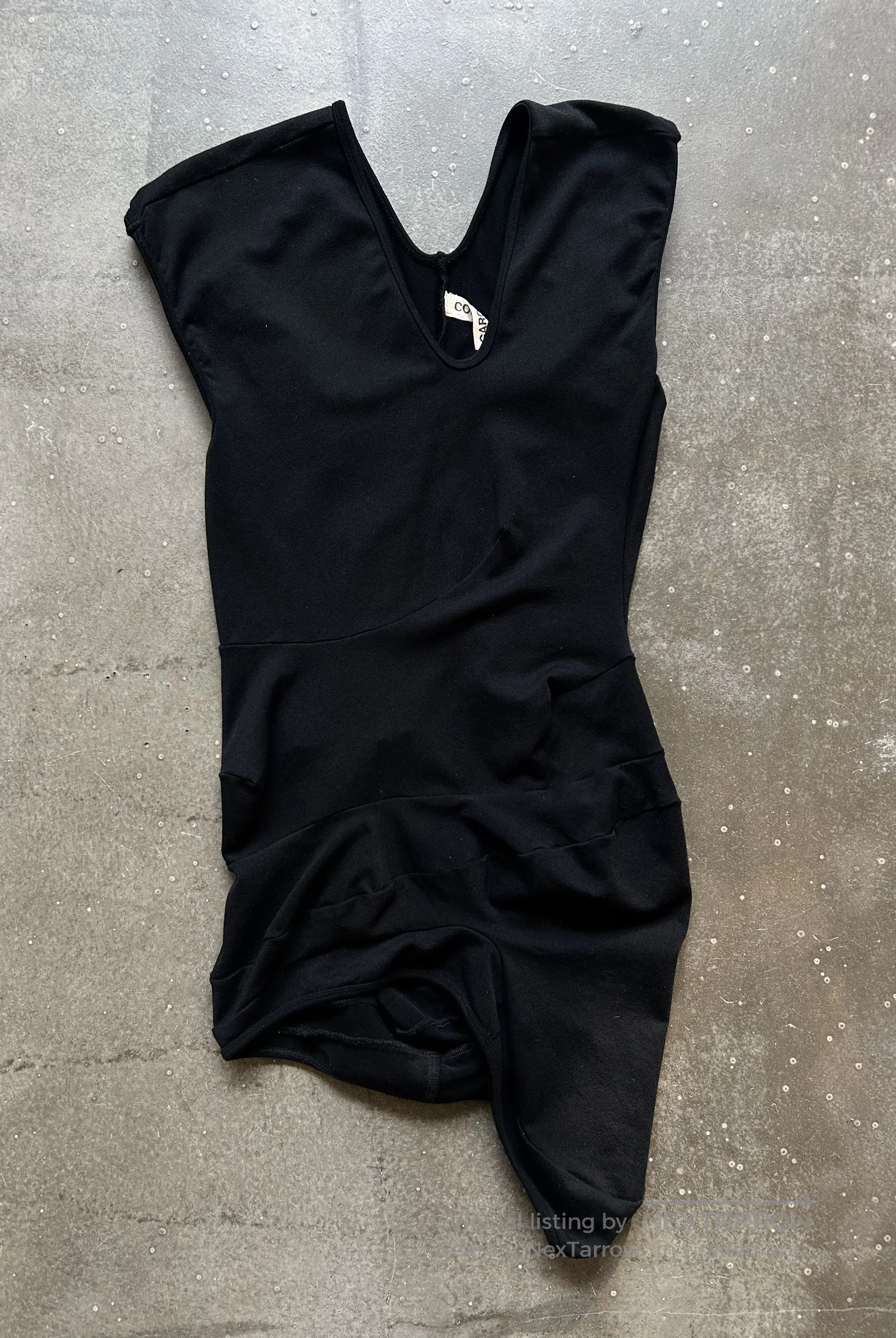 unique black sleeveless top by comme des garcons.