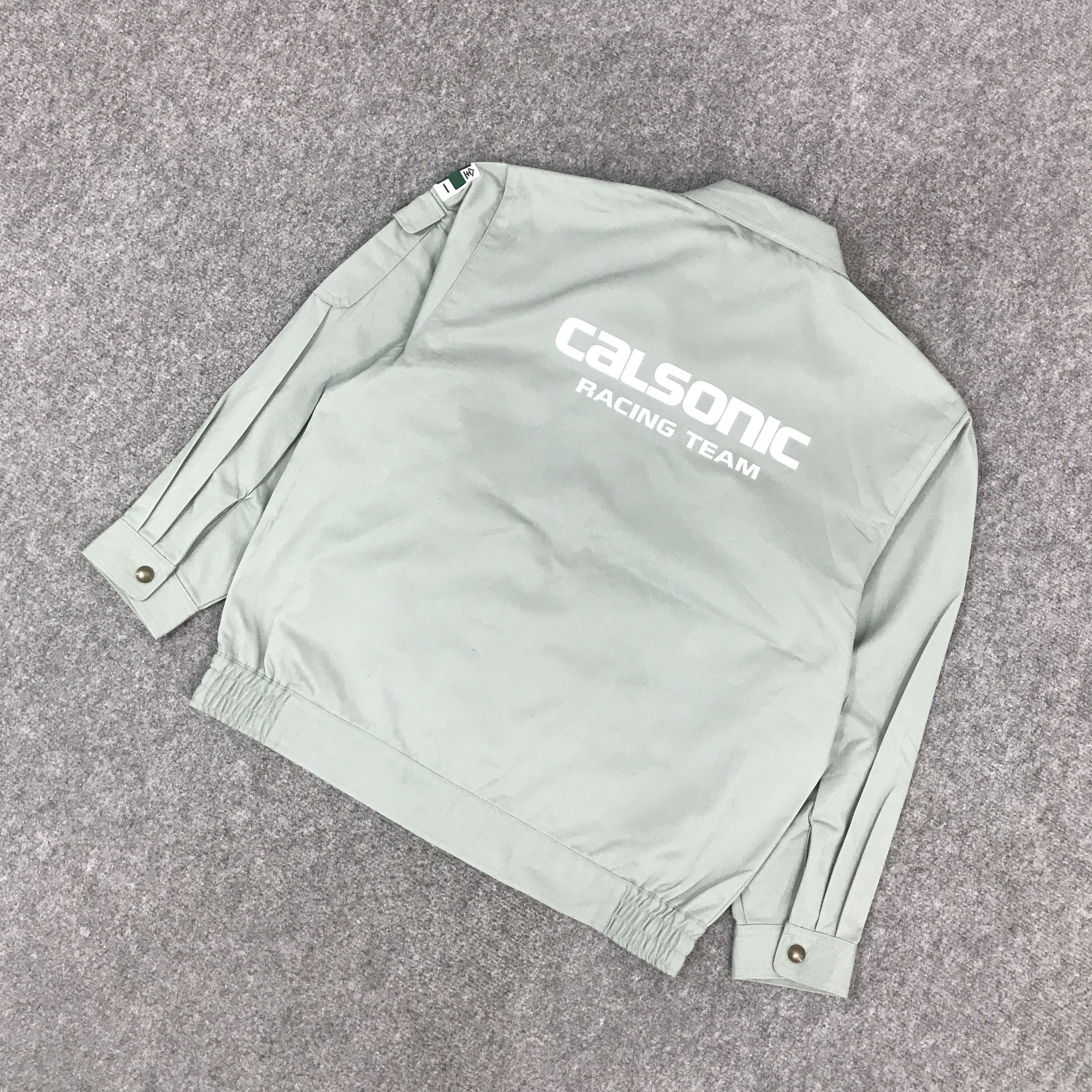 Japanese Brand × Sports Specialties CALSONIC RACING TEAM F1 NISSAN CUSTOM JACKET Size US M / EU 48-50 / 2 - 6 Thumbnail