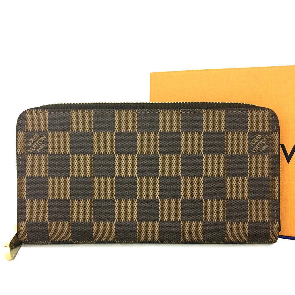 Louis Vuitton PRE-ORDER Louis Vuitton Damier Ebene Zippy Wallet CA0059 Size ONE SIZE - 1 Thumbnail