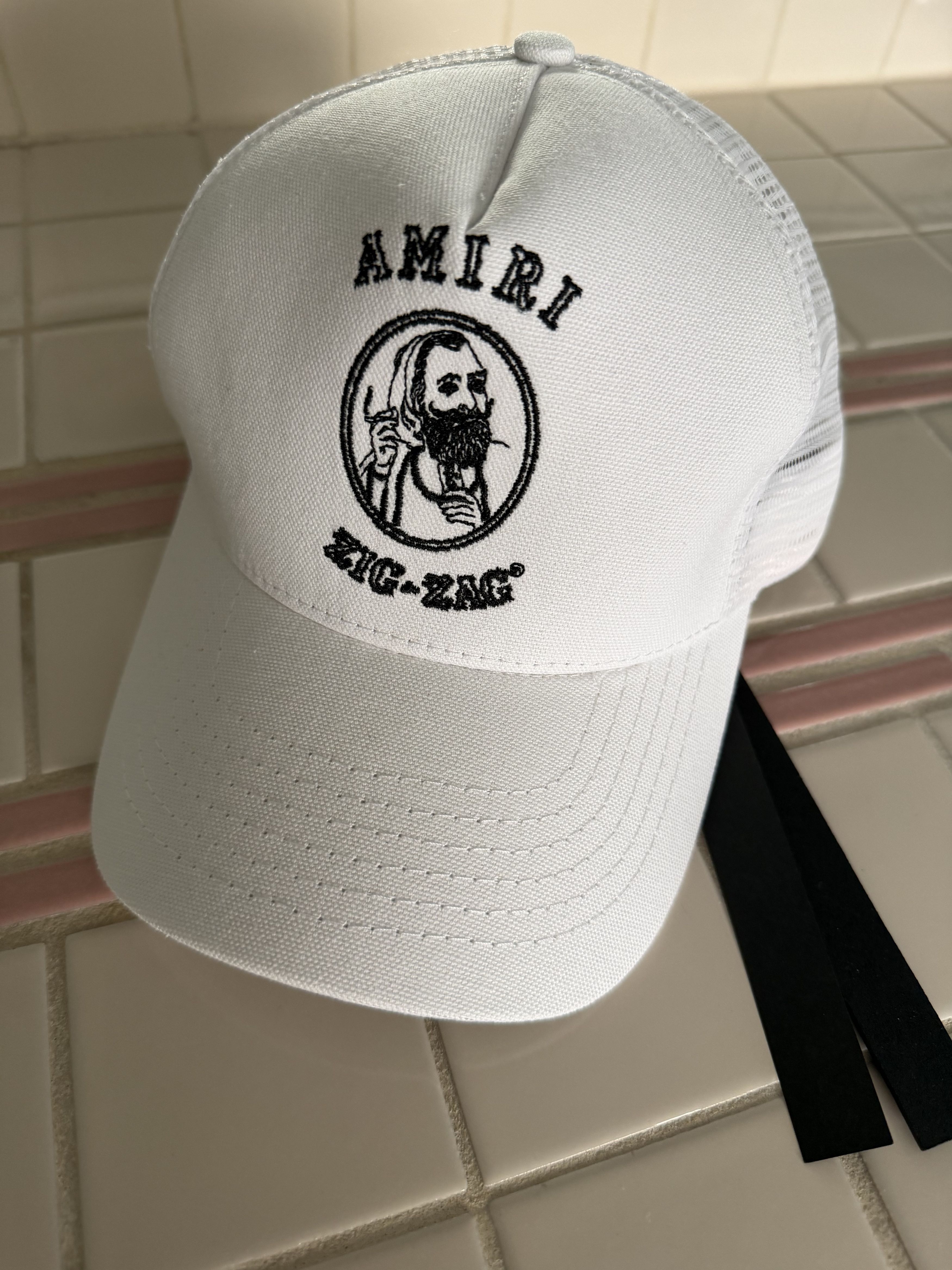 Amiri Amiri Script Trucker Hat in Alabaster White | Grailed