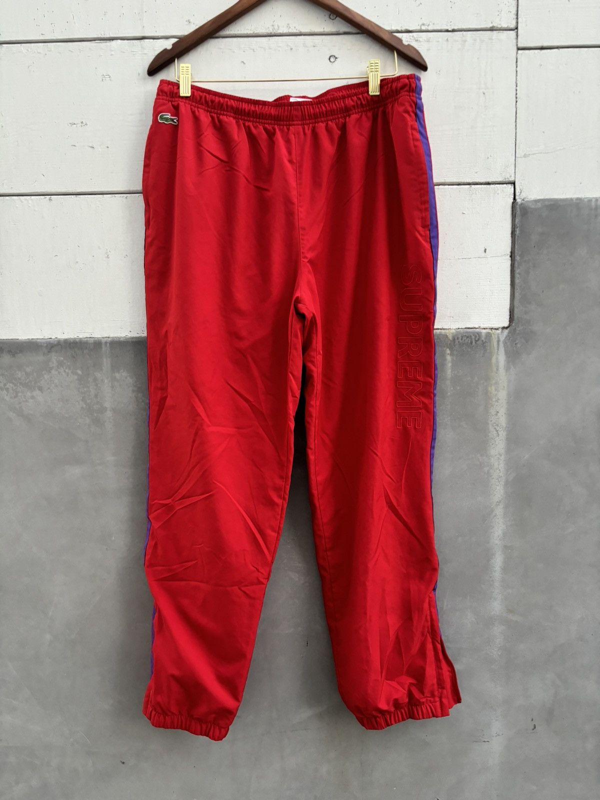 Supreme lacoste track pants online