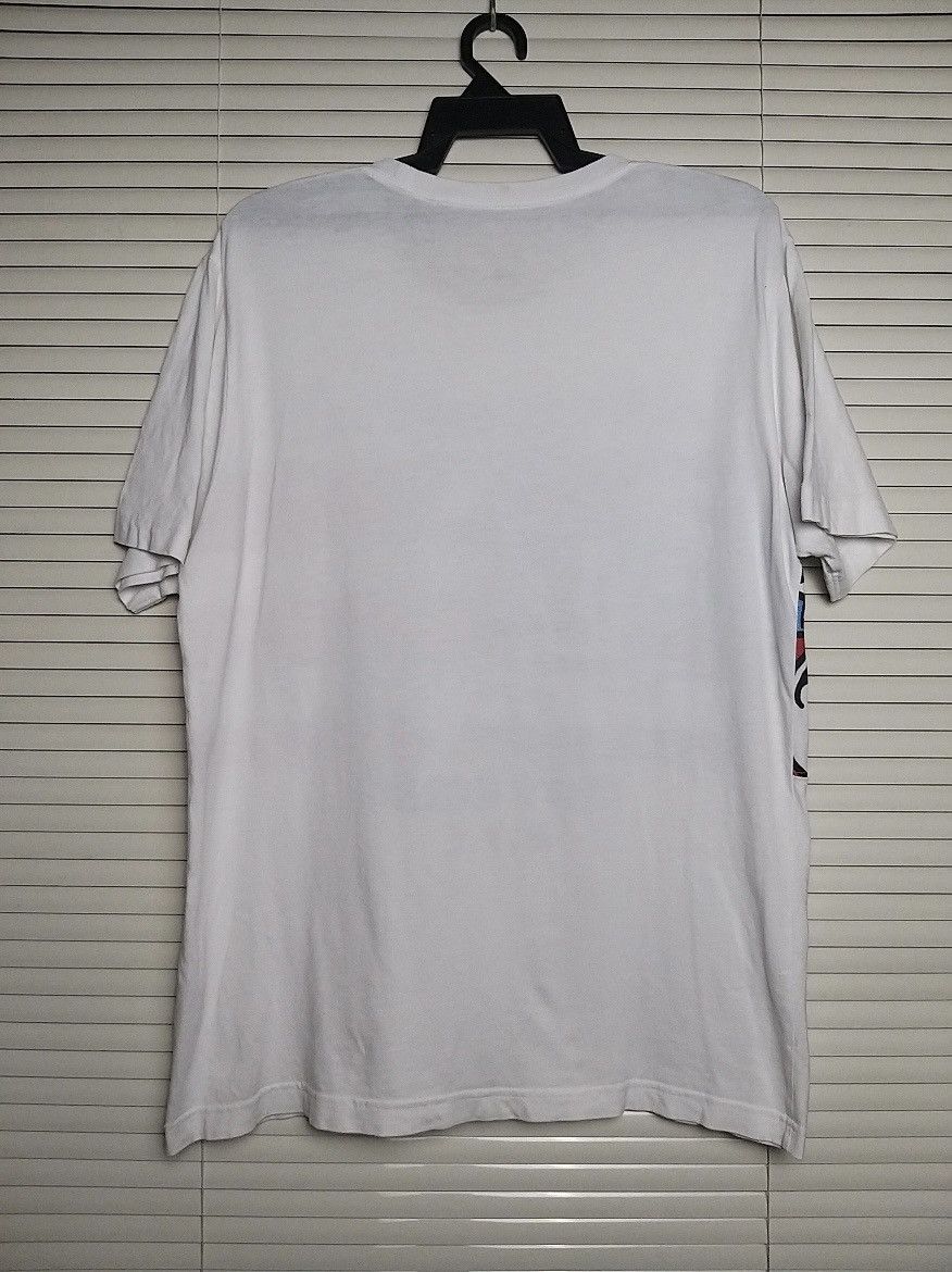 Keith Haring NICE🔥🔥KEITH HARING X UNIQLO AMERICAN FLAG ART T SHIRT Size US L / EU 52-54 / 3 - 2 Thumbnail