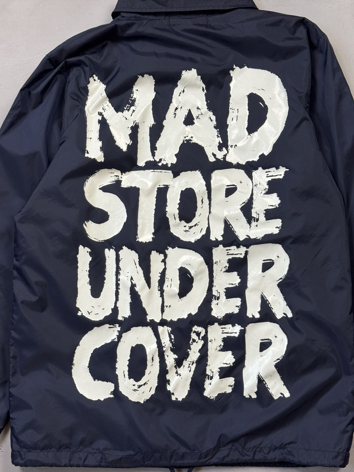 Undercover Undercover Madstore Logo Coach Jacket(Navy/S) Size US S / EU 44-46 / 1 - 2 Thumbnail