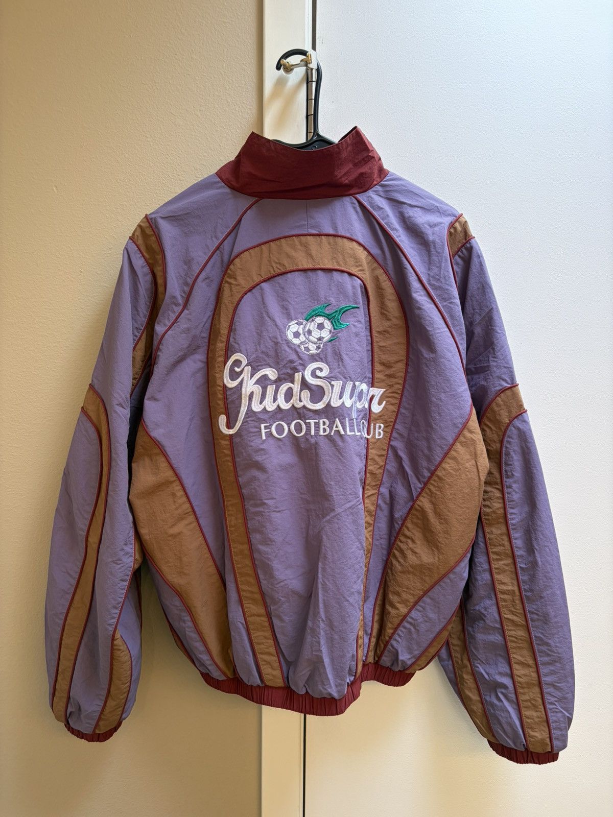 KidSuper RONALDINHO X KIDSUPER WINDBREAKER [BLUE/ RED / BROWN] Size US S / EU 44-46 / 1 - 2 Thumbnail