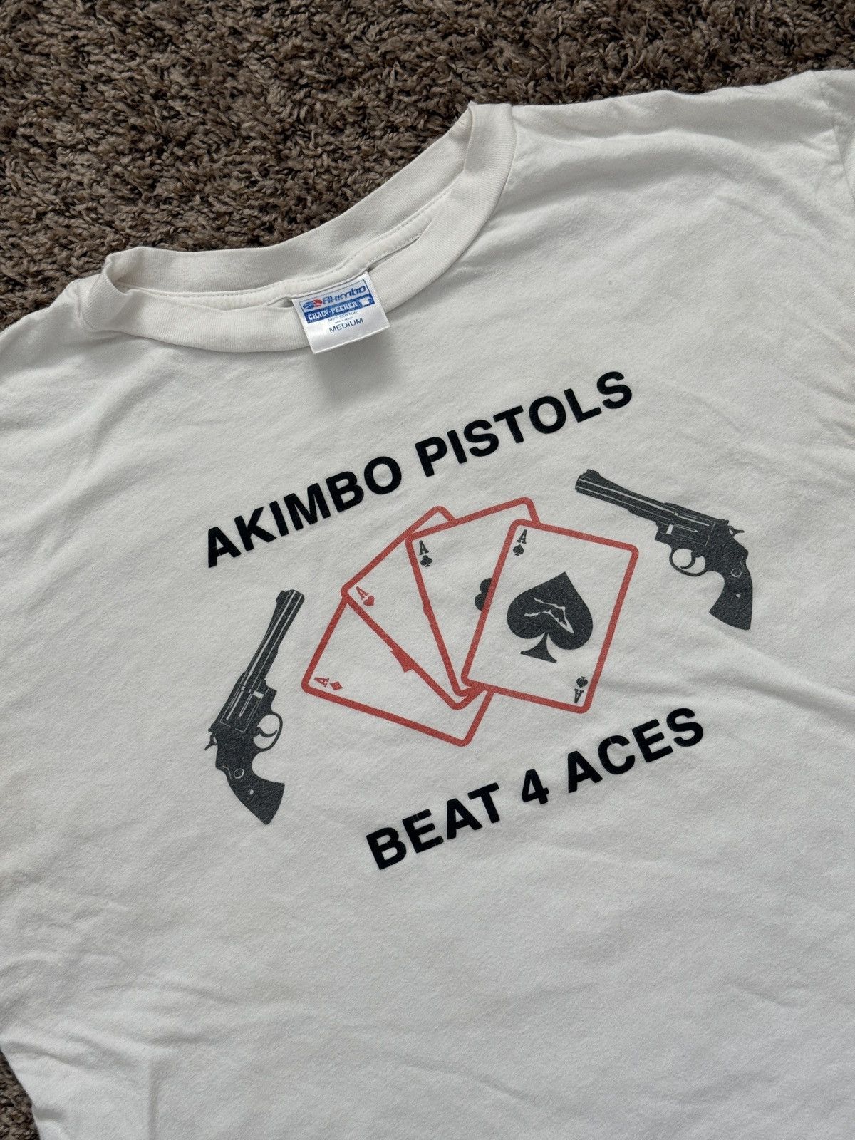 Akimbo Club Akimbo Club White “CHAIN-PEEKER” Single Stitched Tee