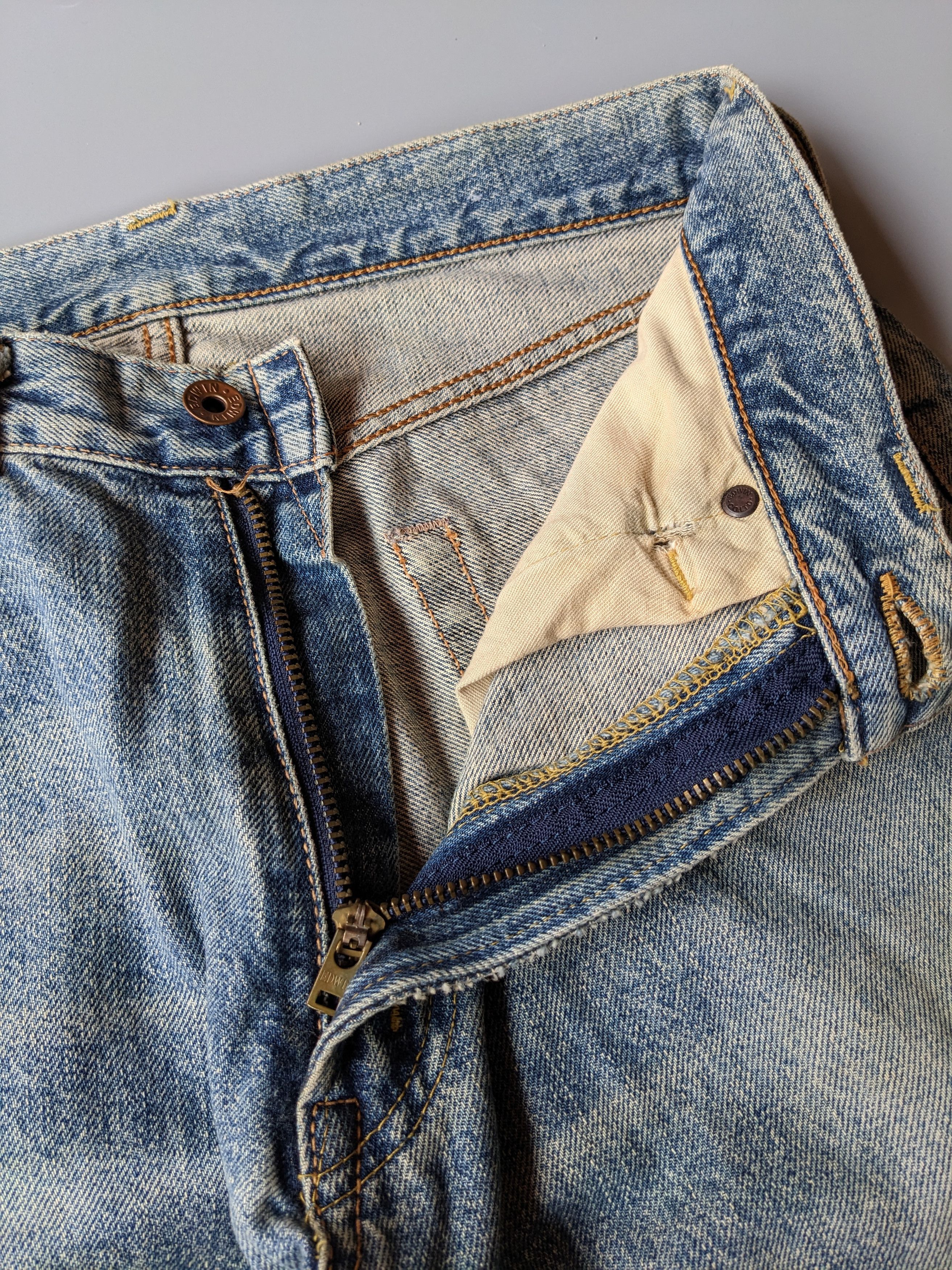 Edwin 505x faded blue distressed selvedge jeans