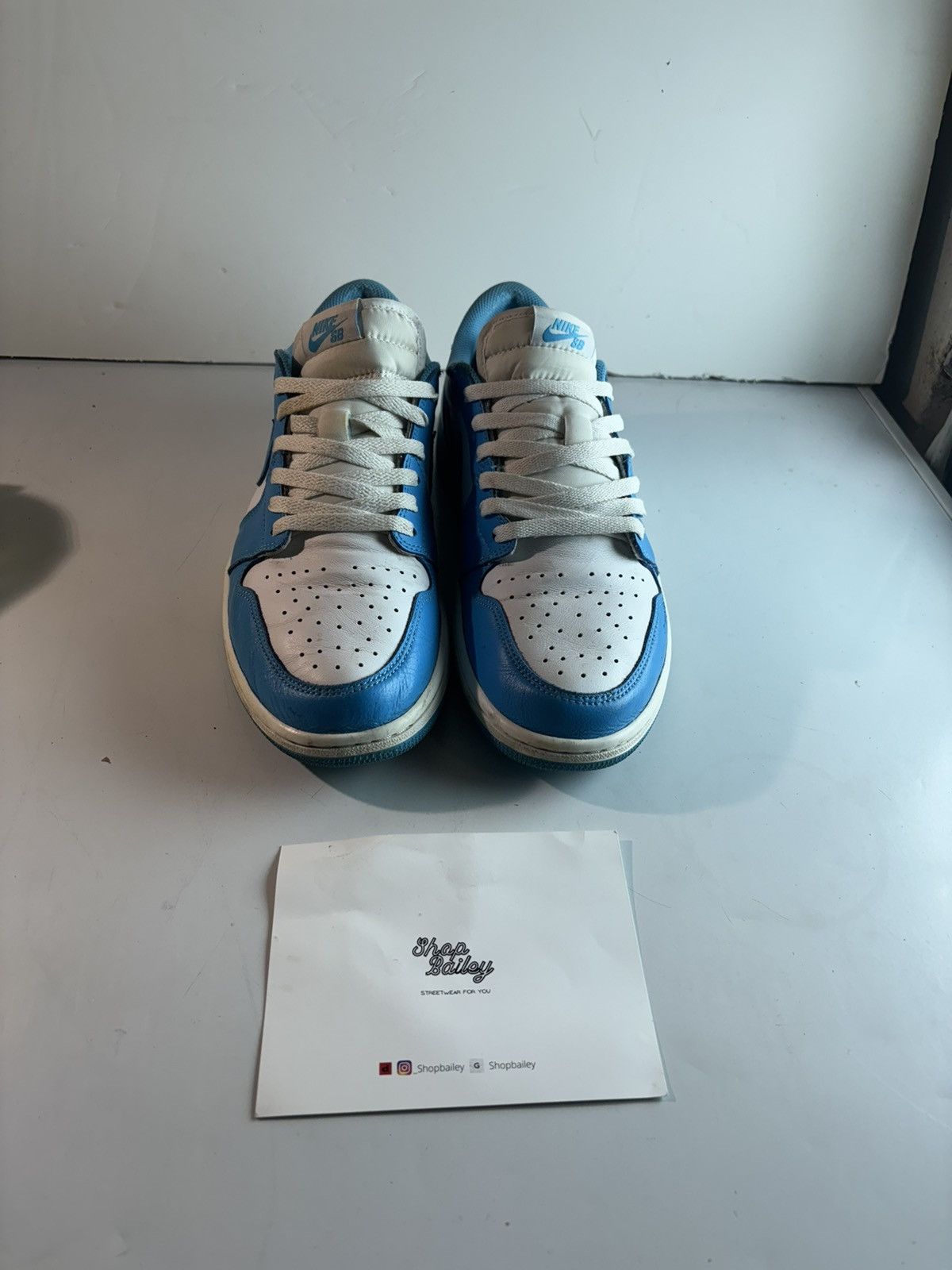 image of Jordan Nike Jordan 1 Retro Low Sb Unc Shoes in Powder Blue, Men's (Size 11)