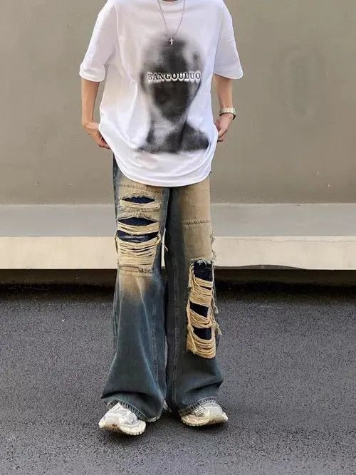 Retro ripped distressed draped jeans