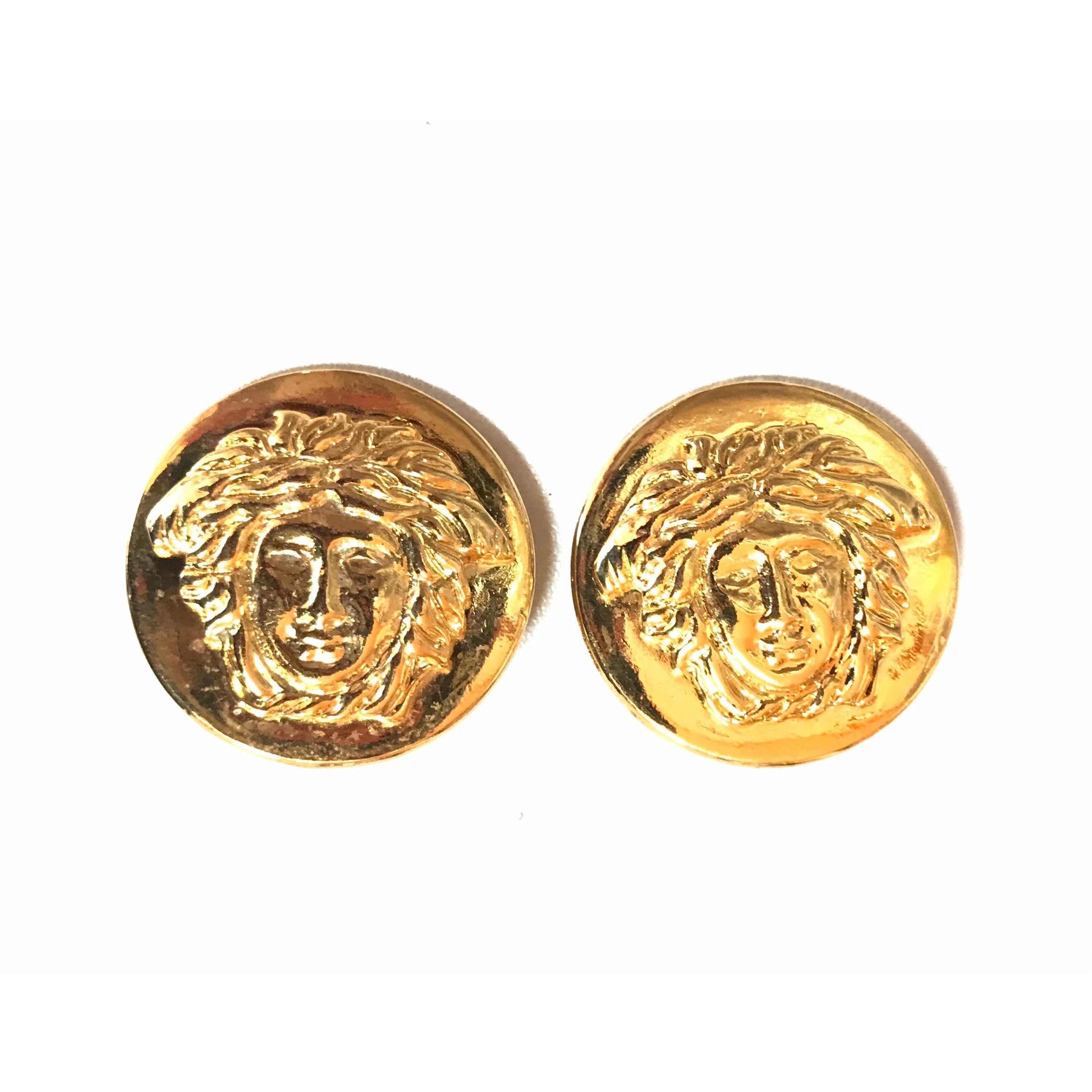 Vintage Gianni Versace round earrings with medusa face motif