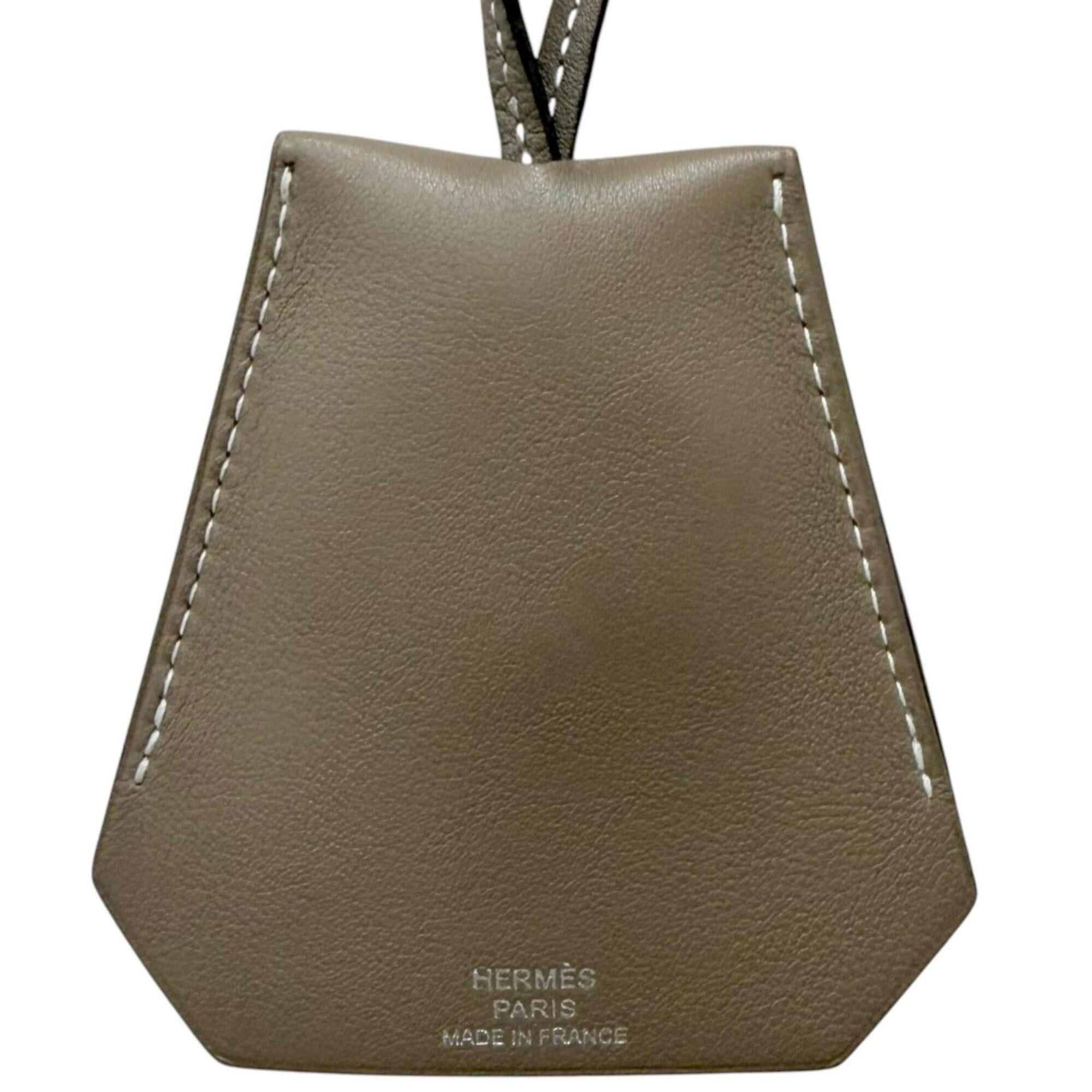 Hermes HERMES Large Leather Clochette Necklace in Veau Swift, Etoupe, with C stamp, Made France, Men's/Women's. Size ONE SIZE - 1 Thumbnail