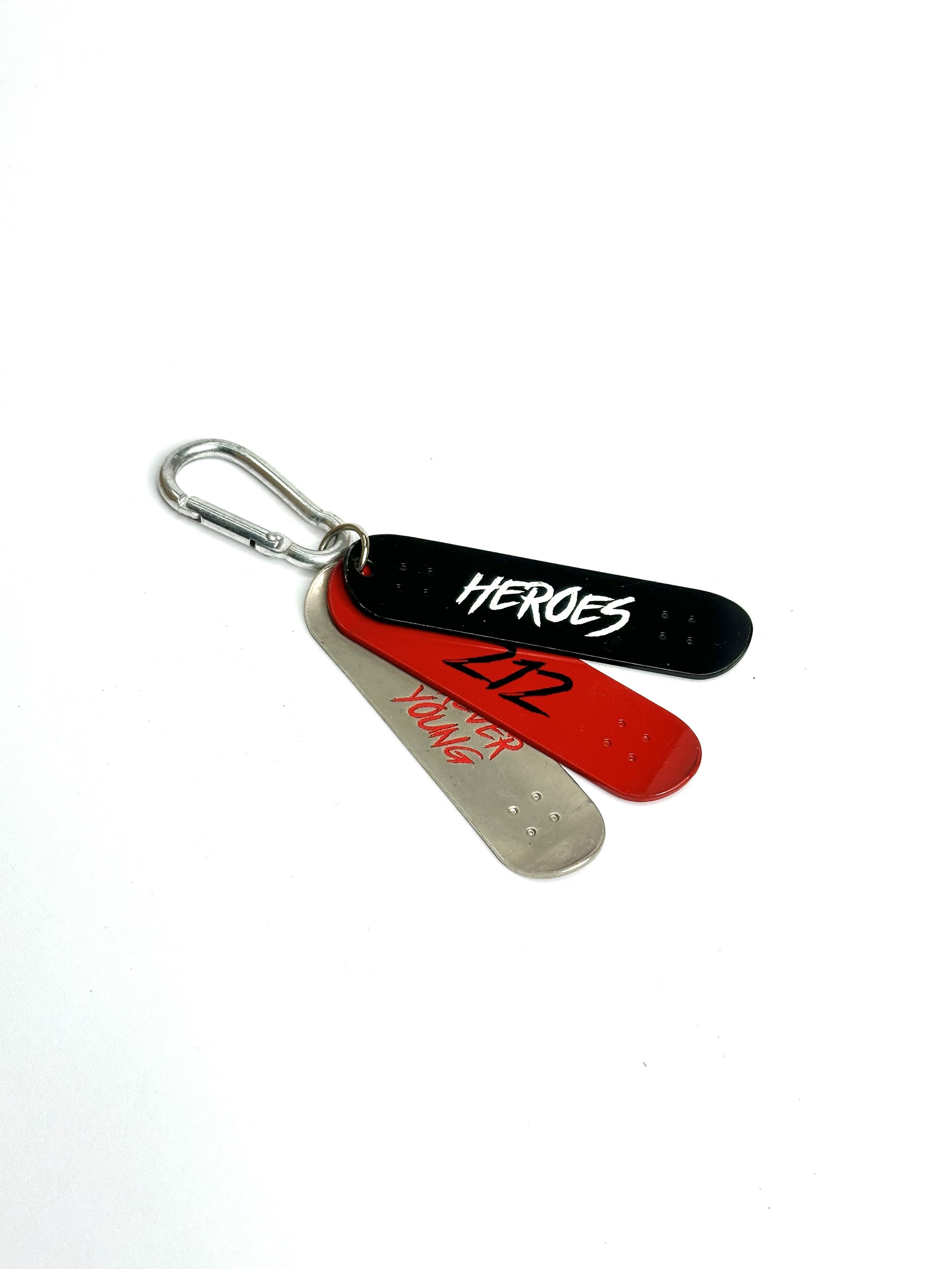 Carolina Herrera KH Heroes 212 Forever Young skateboards multi layer keychain Size ONE SIZE - 1 Thumbnail