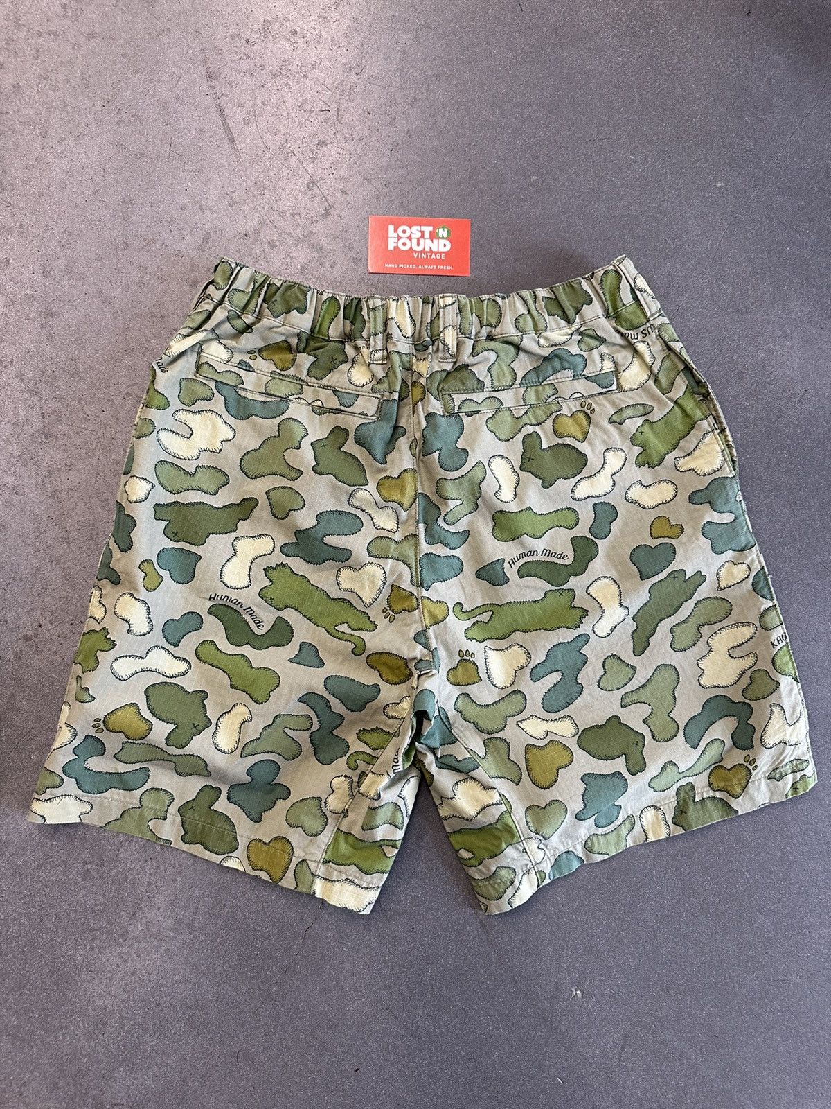 Human Made Human Made x Kaws Made Camo Shorts Olive Drab | Grailed