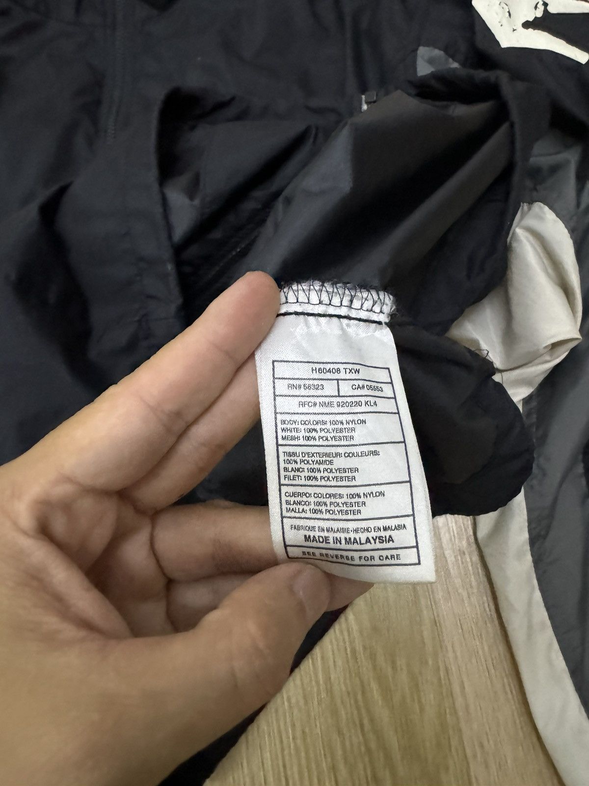 Vintage 90’s Nike swoosh spellout windbreaker