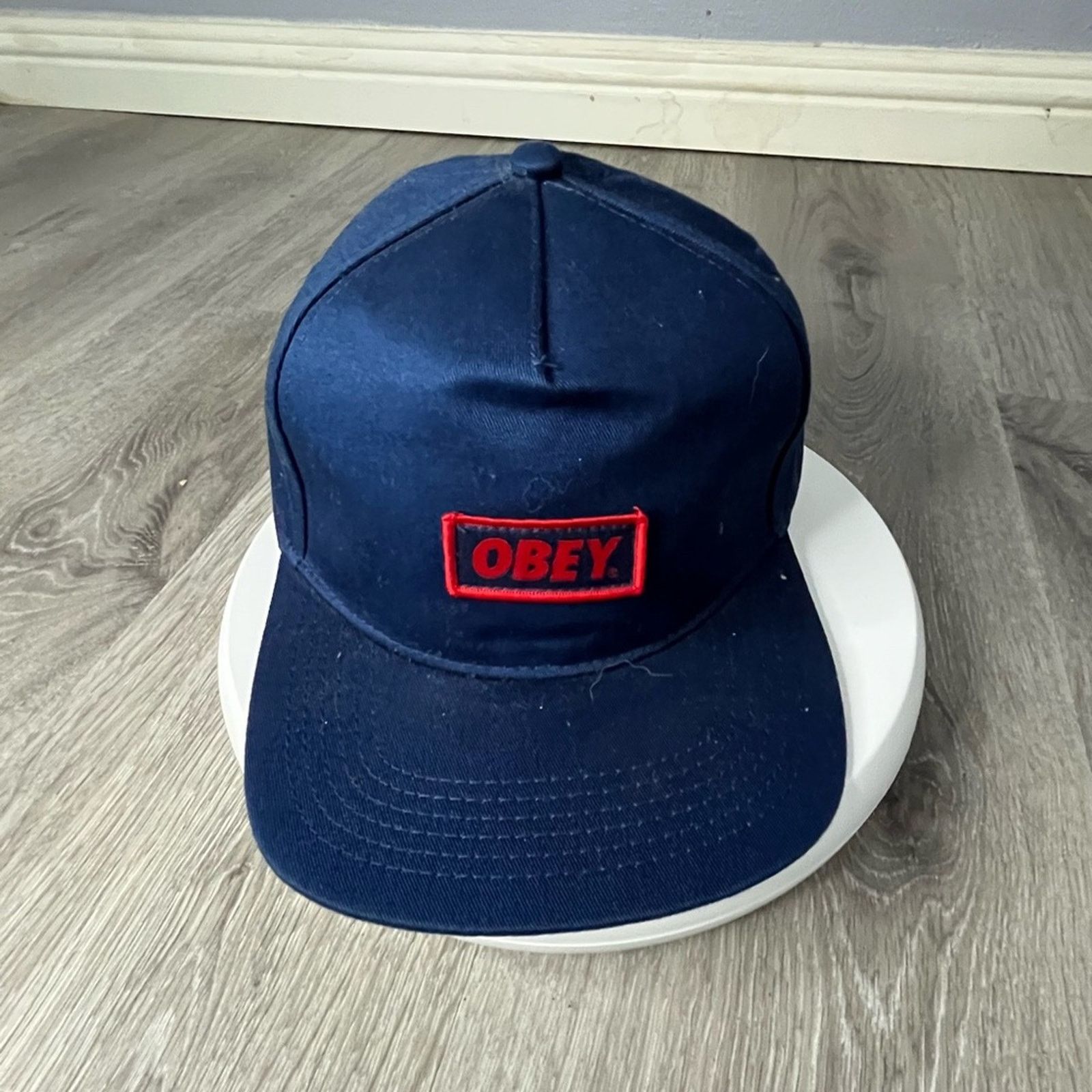 Red obey hat deals