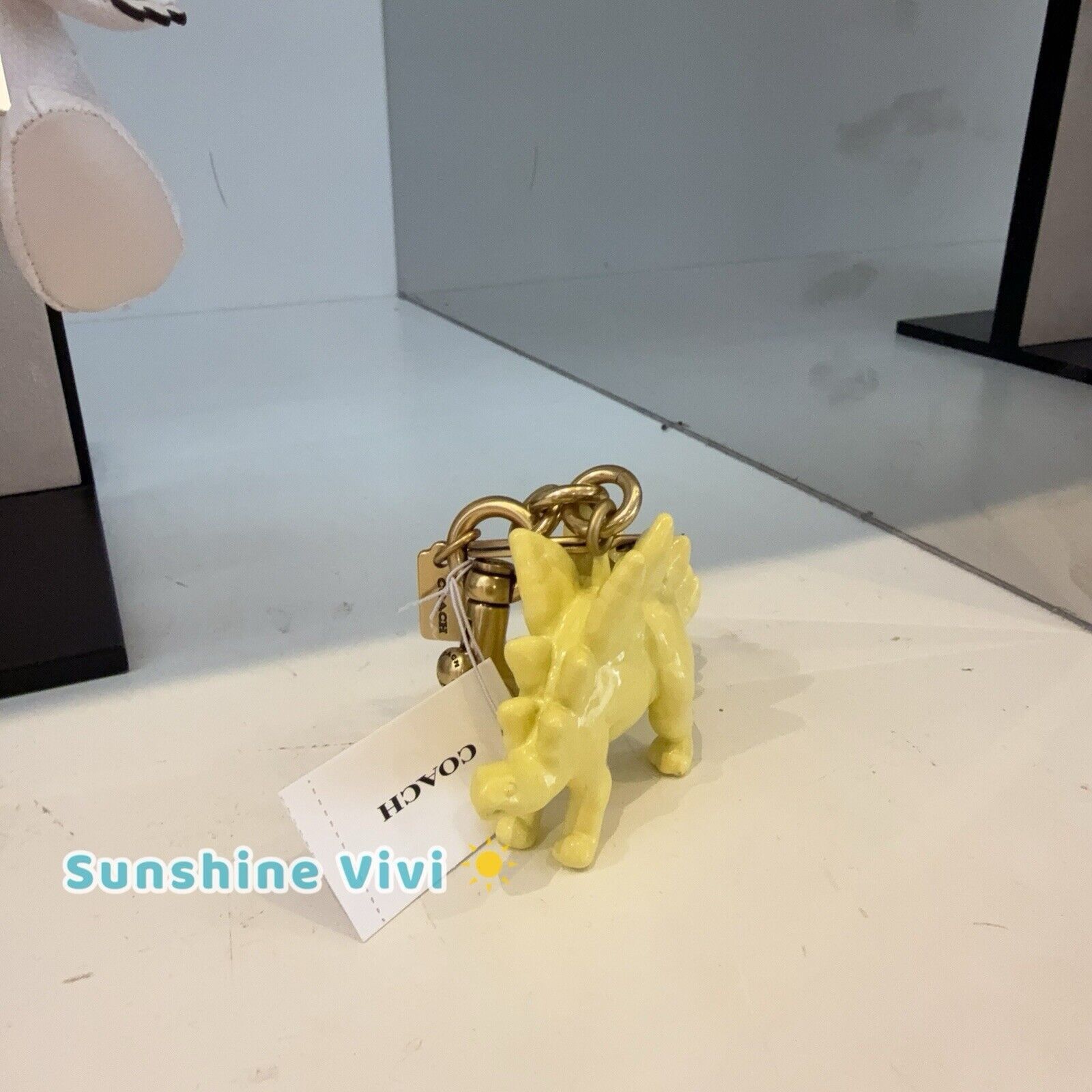 Coach NWT Coach CAX77 Keychain Stegosaurus Bag Charm Brass/Yellow Size ONE SIZE - 5 Thumbnail