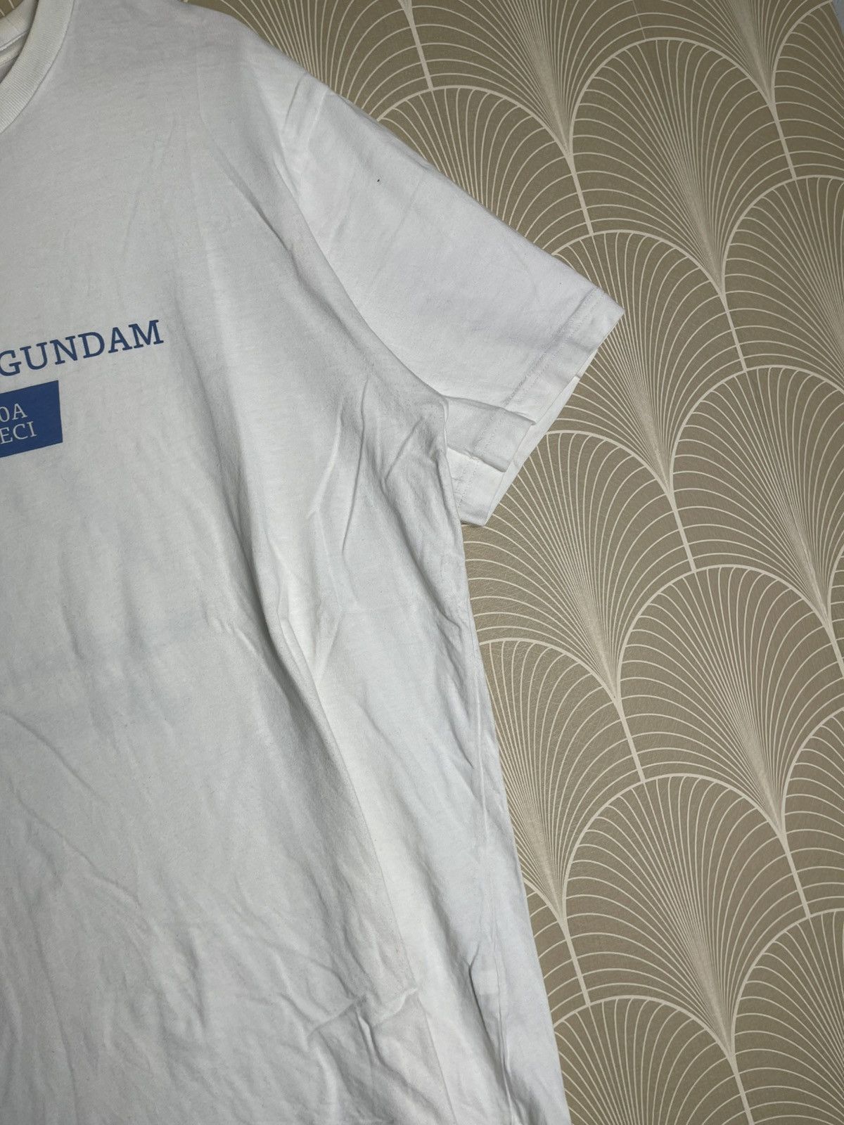 Anime × Japanese Brand × Uniqlo 2000s FREEDOM GUNDAM TSHIRT SOLO CHARACTER HERO Size US XL / EU 56 / 4 - 5 Thumbnail